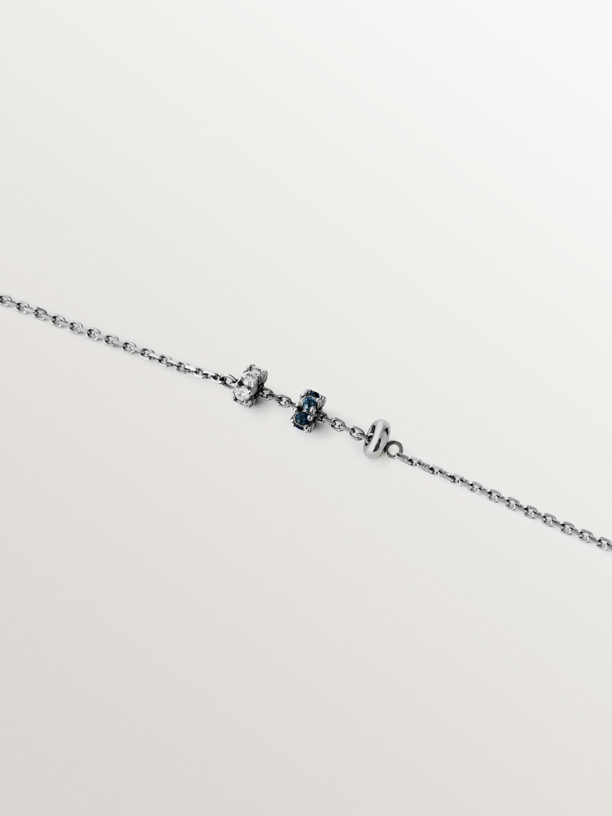 9K white gold bracelet with blue sapphires and diamonds