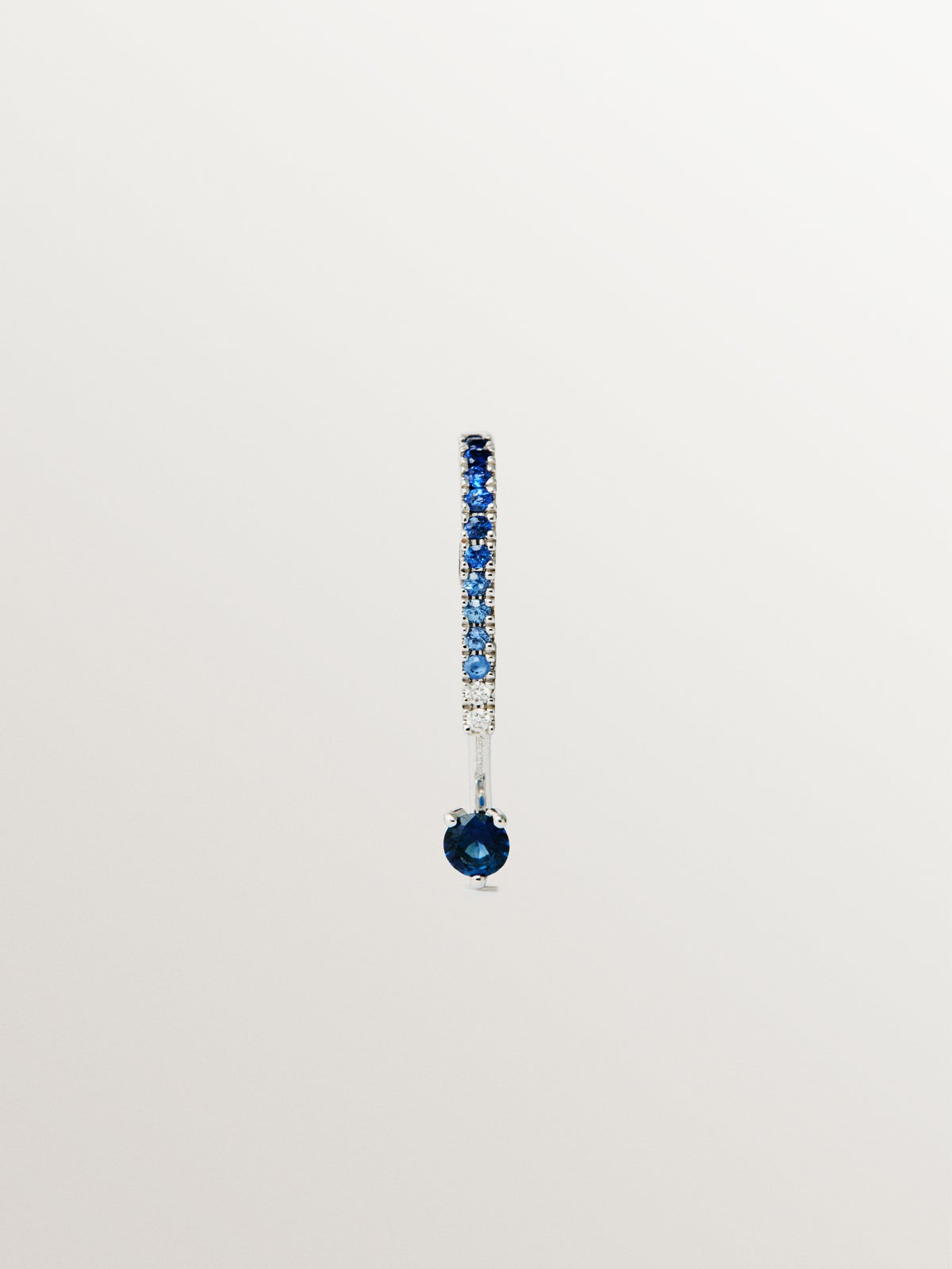 9K white gold single earring with blue sapphires and diamonds