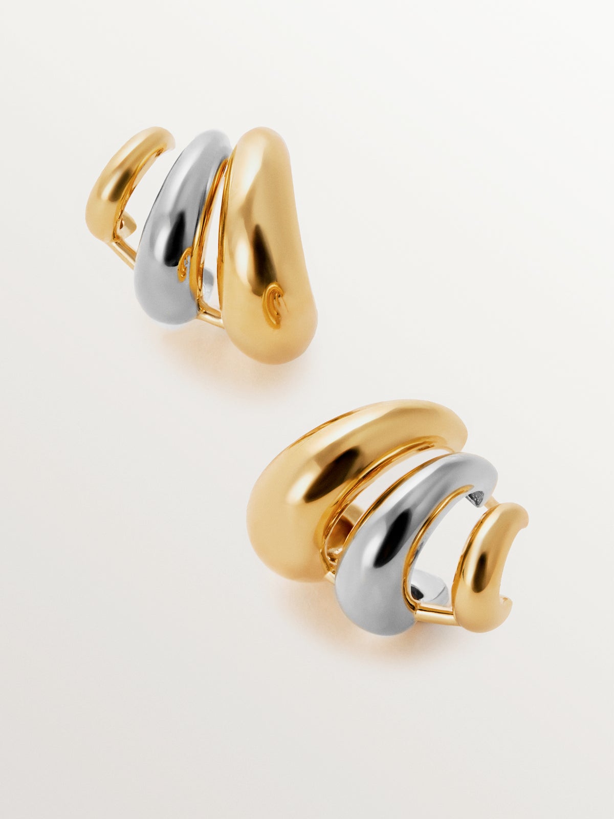 Climbing earrings in rhodium-plated 925 silver and 18K yellow gold