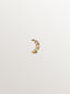 18K yellow gold piercing with brilliant cut diamonds and a moon shape