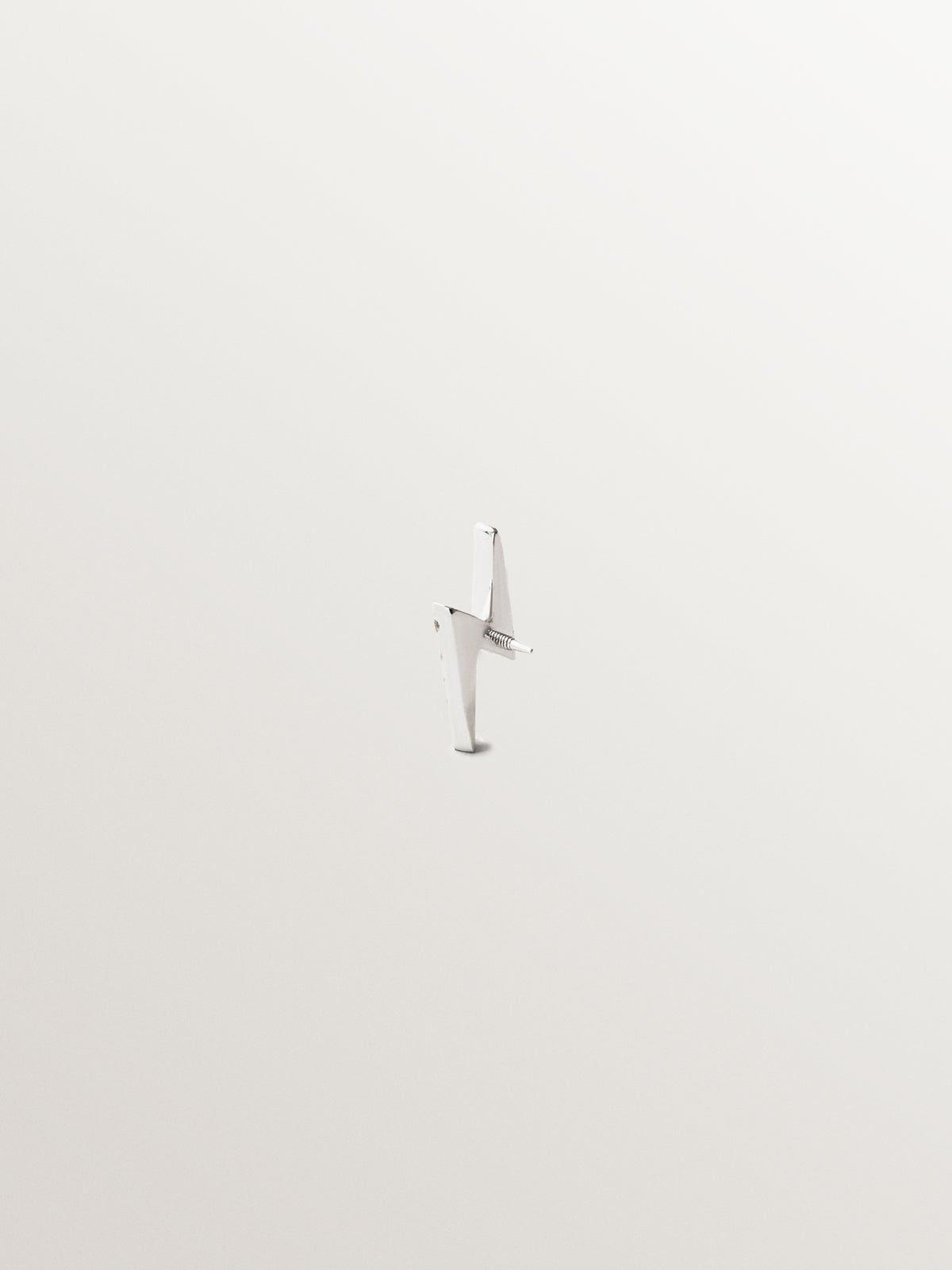 18K white gold piercing with brilliant-cut diamonds and lightning bolt shape