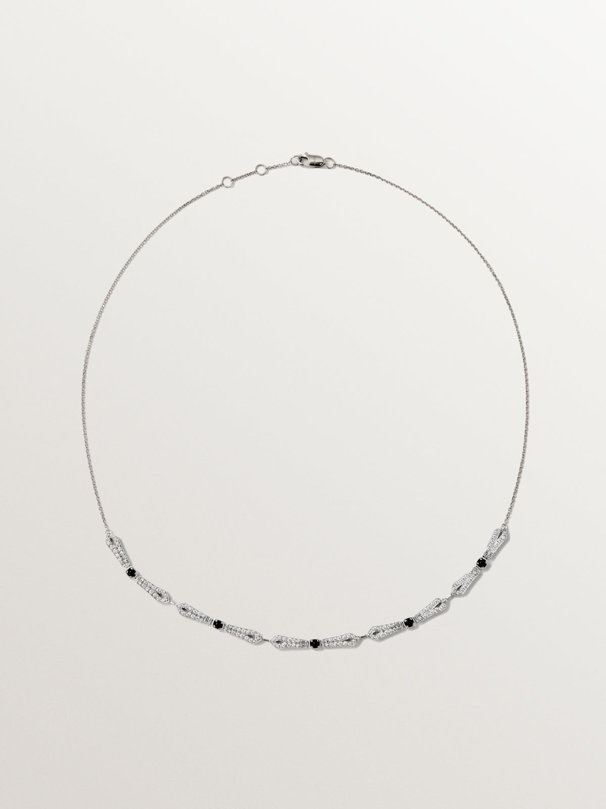 18K white gold pendant with black onyx and brilliant cut diamonds