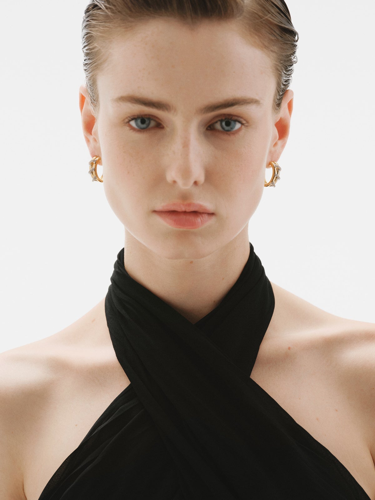 925 sterling silver hoop earrings plated with rhodium and 18K yellow gold with white topaz pavé
