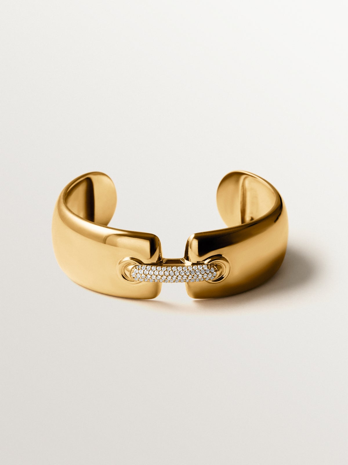 Rigid bracelet in 925 silver plated in 18K yellow gold with topaz pavé