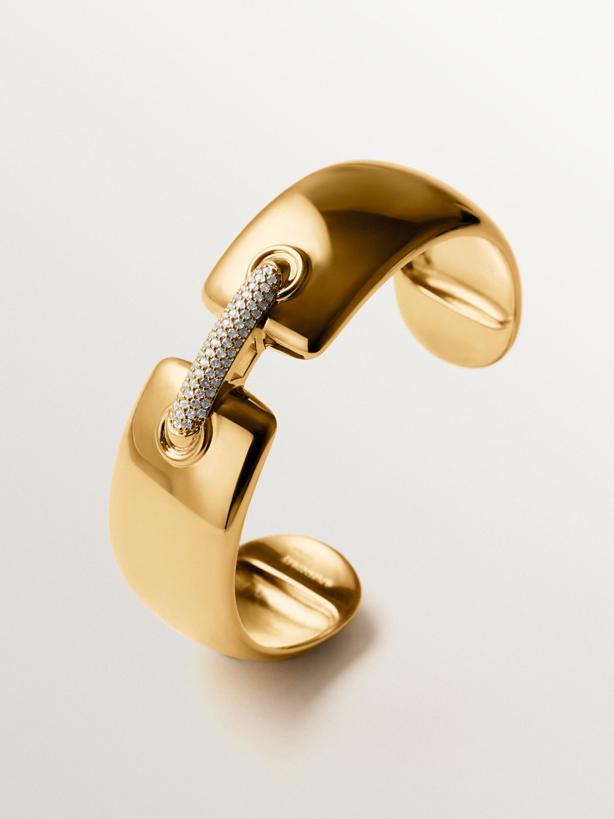 Rigid bracelet in 925 silver plated in 18K yellow gold with topaz pavé