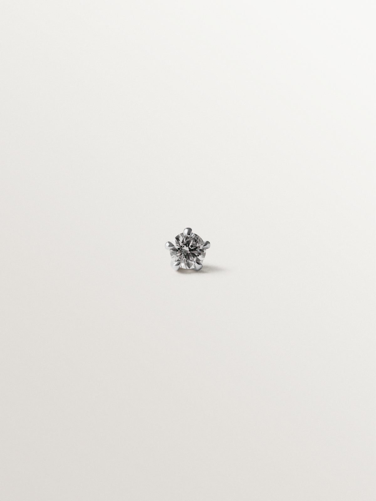 18K white gold piercing with diamond