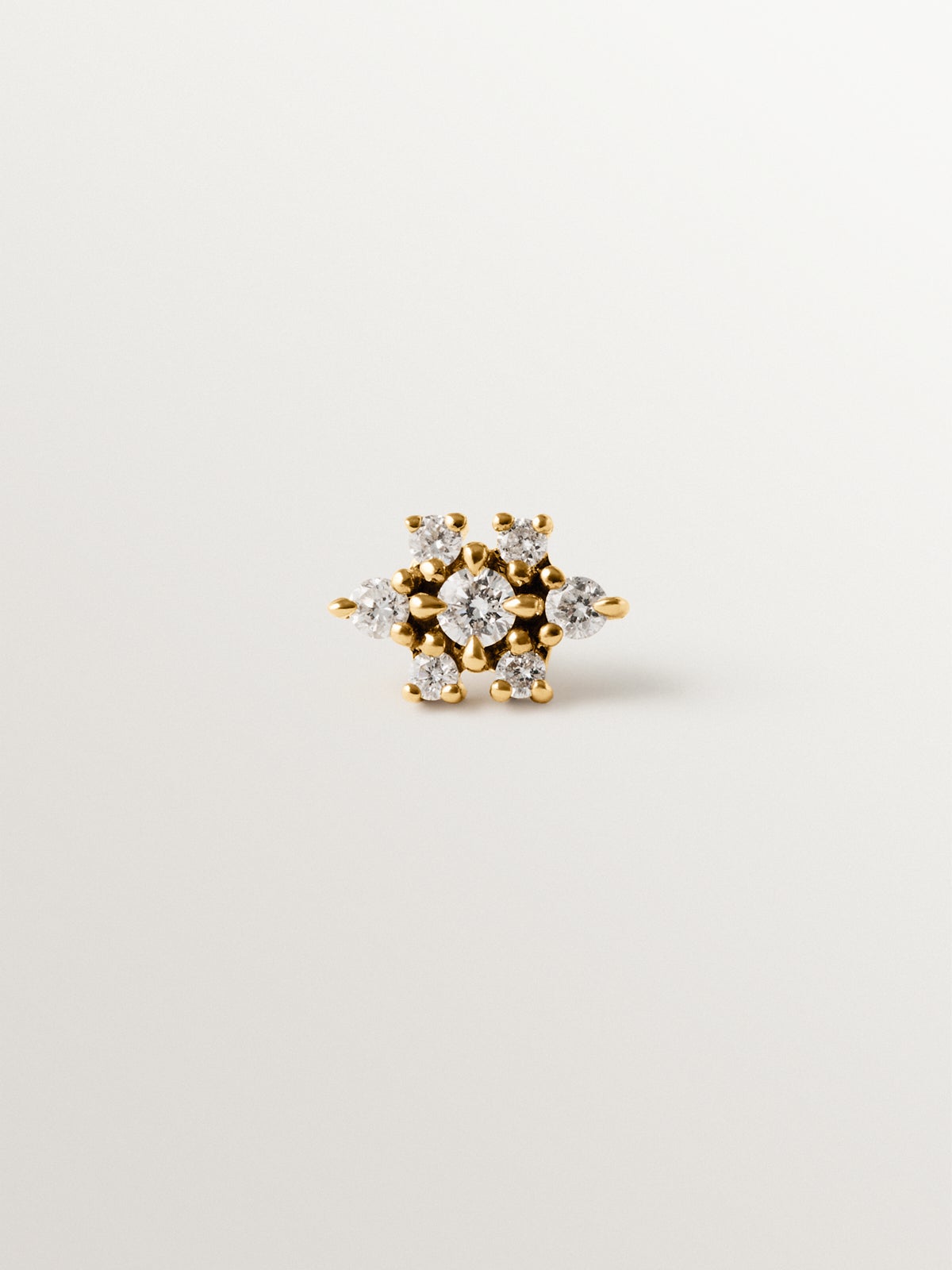 18K yellow gold piercing with diamonds and flower shape