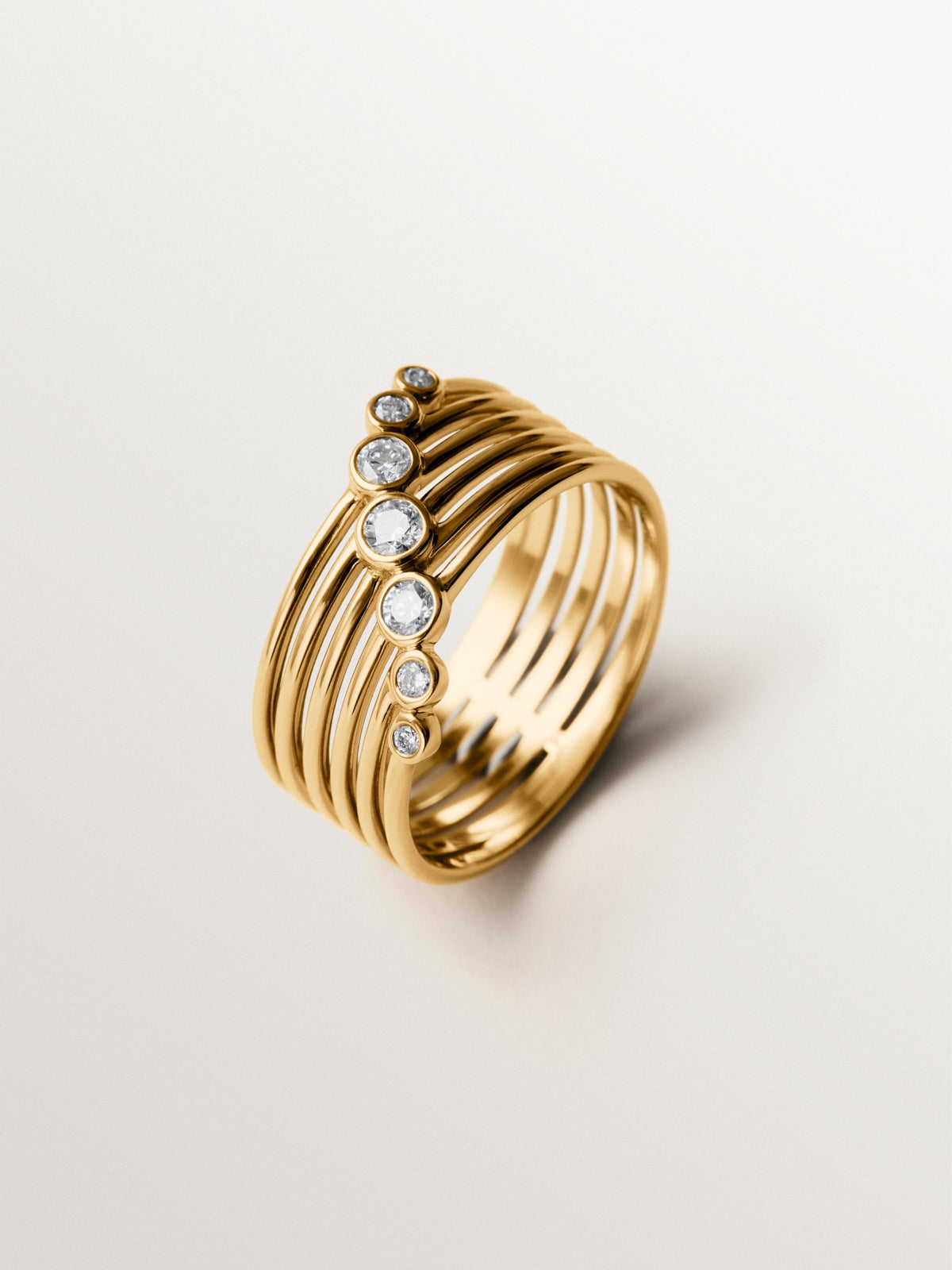 9K white and yellow gold multi-arm ring with brilliant-cut diamonds