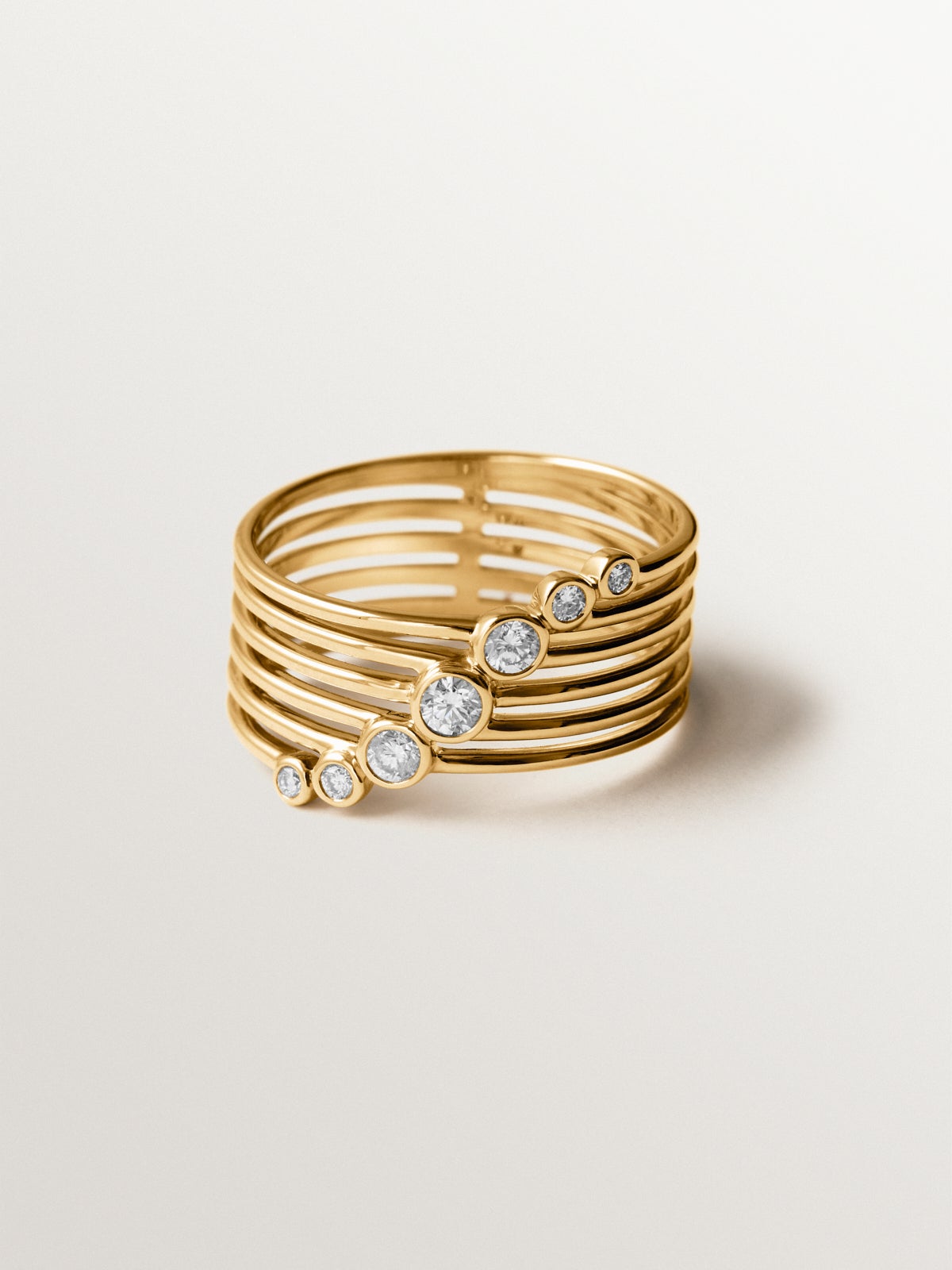 9K white and yellow gold multi-arm ring with brilliant-cut diamonds