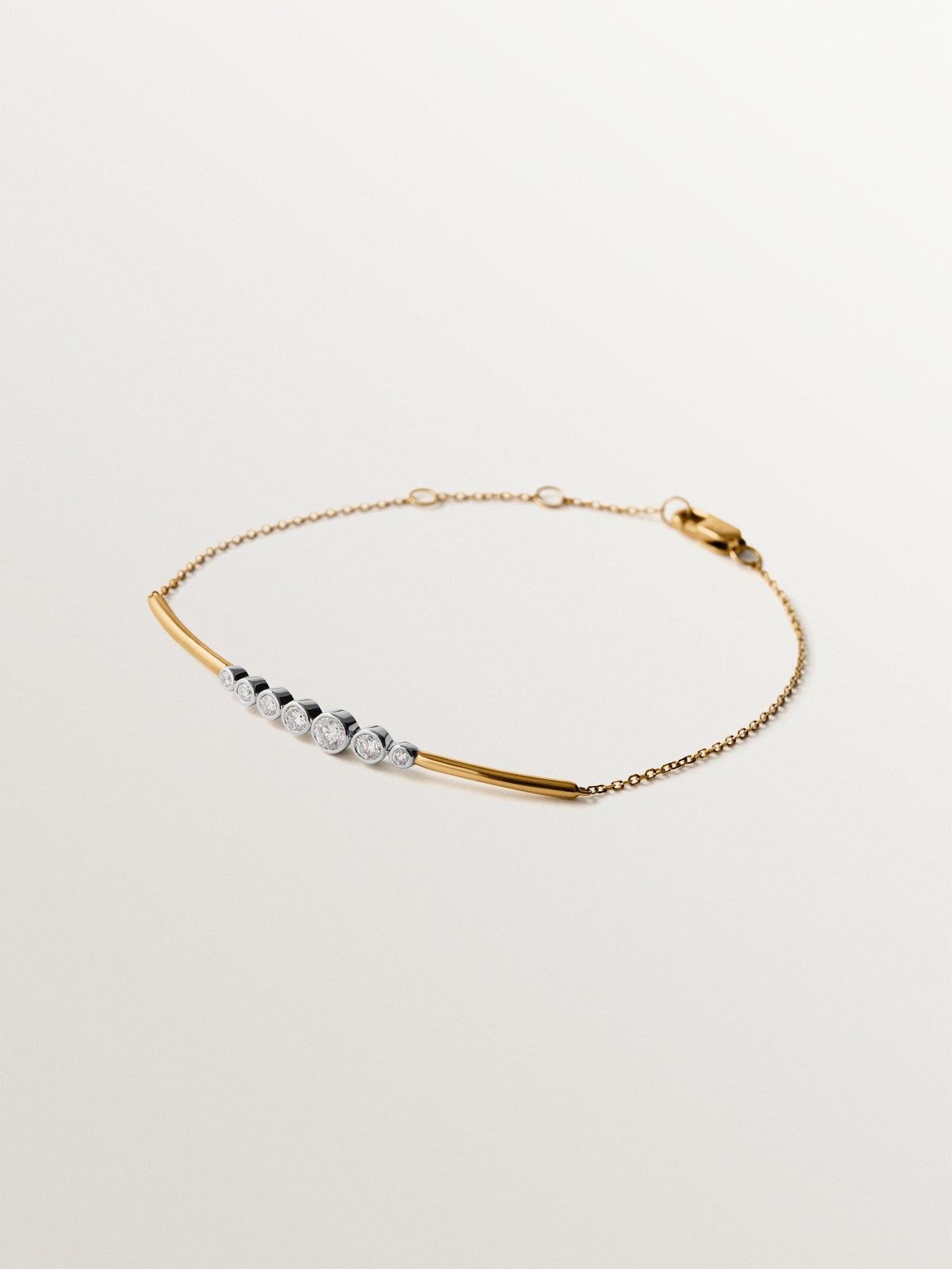 9K white and yellow gold bracelet with diamonds