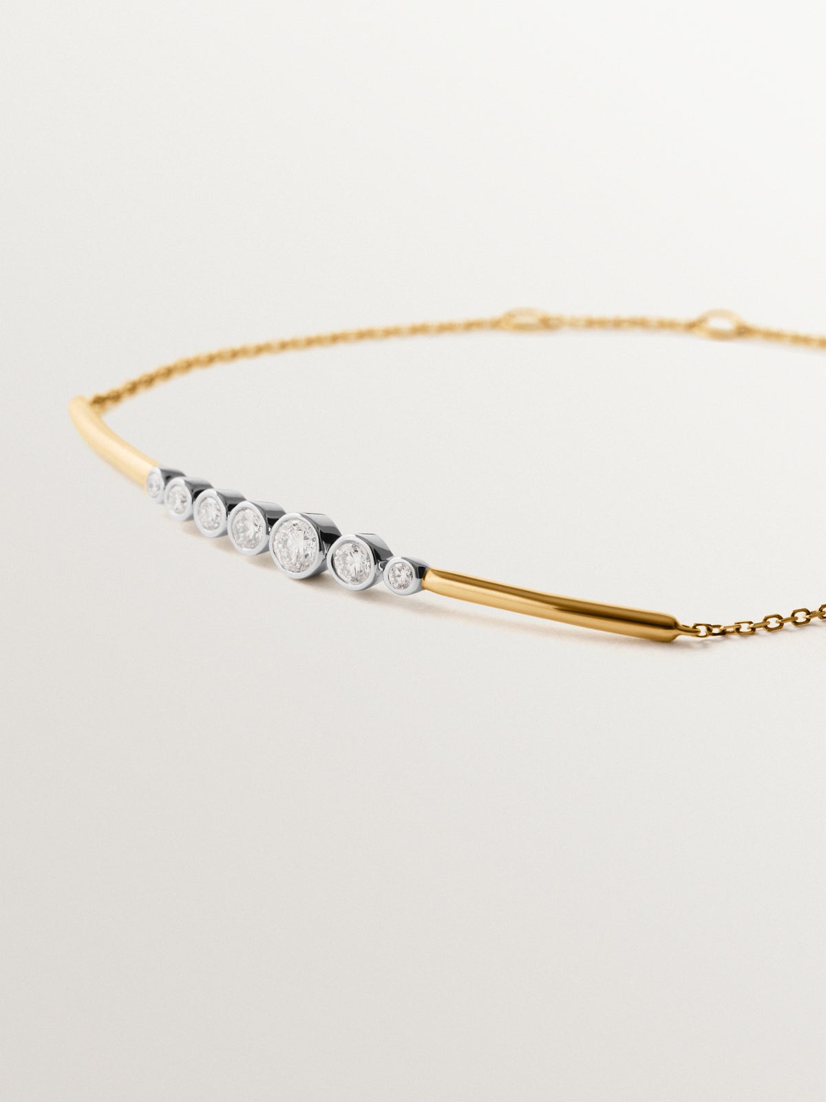 9K white and yellow gold bracelet with diamonds
