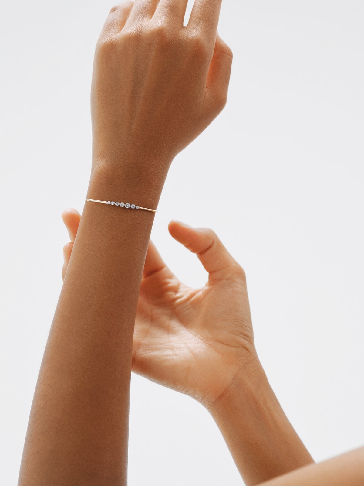 9K white and yellow gold bracelet with diamonds