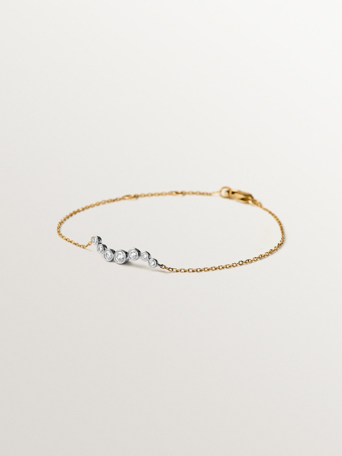 9K white and yellow gold bracelet with diamonds