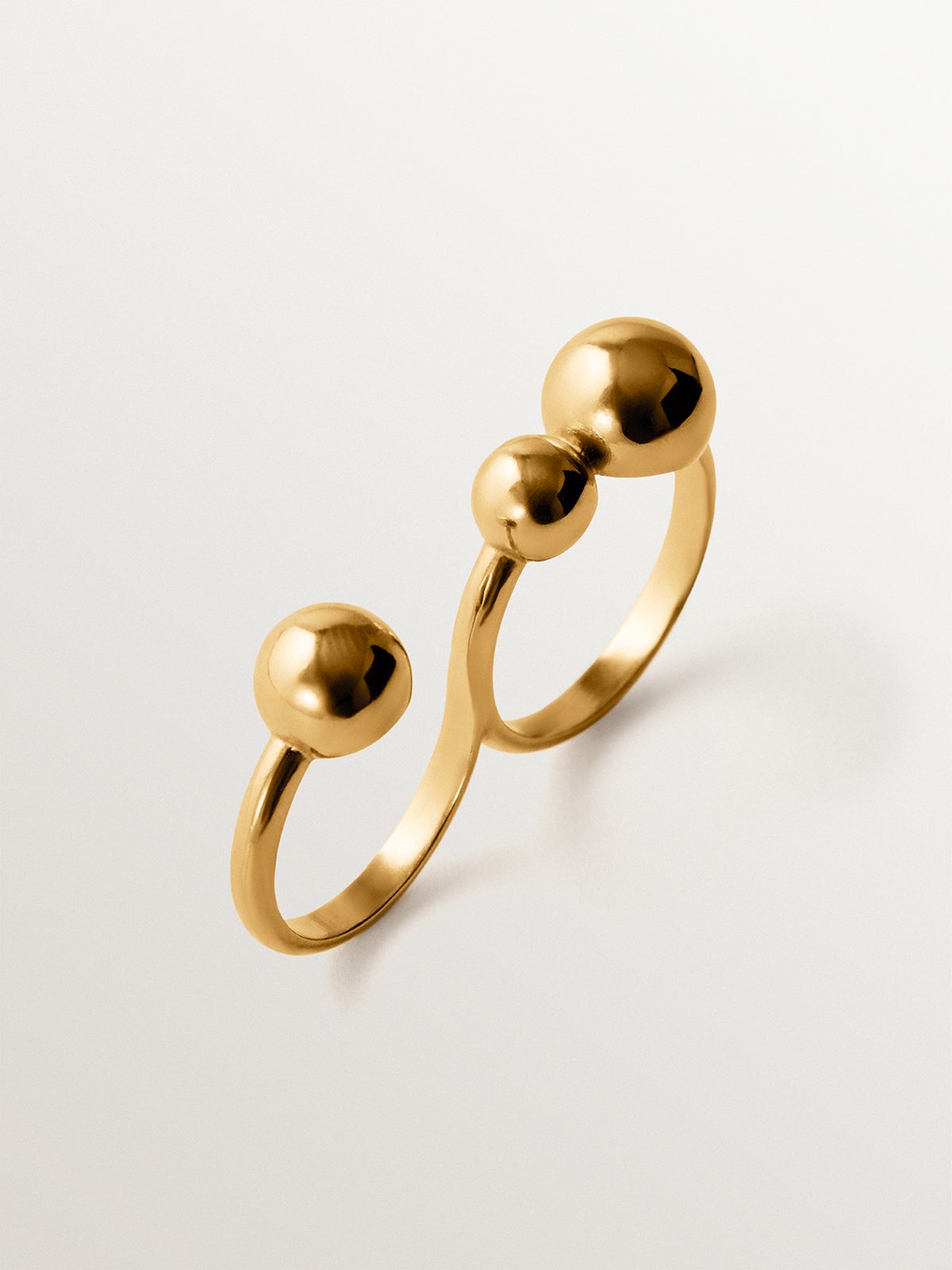 Double ring in 925 silver plated with 18K yellow gold with sphere motif