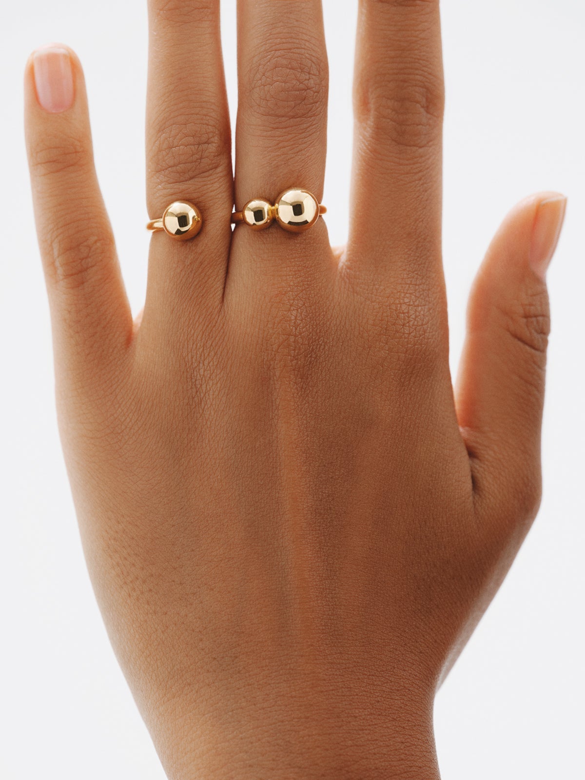 Double ring in 925 silver plated with 18K yellow gold with sphere motif