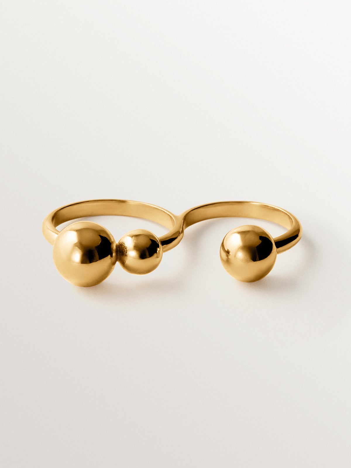 Double ring in 925 silver plated with 18K yellow gold with sphere motif
