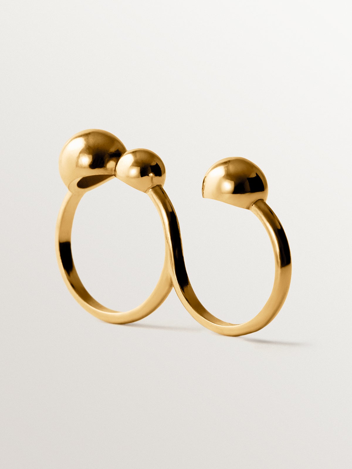 Double ring in 925 silver plated with 18K yellow gold with sphere motif