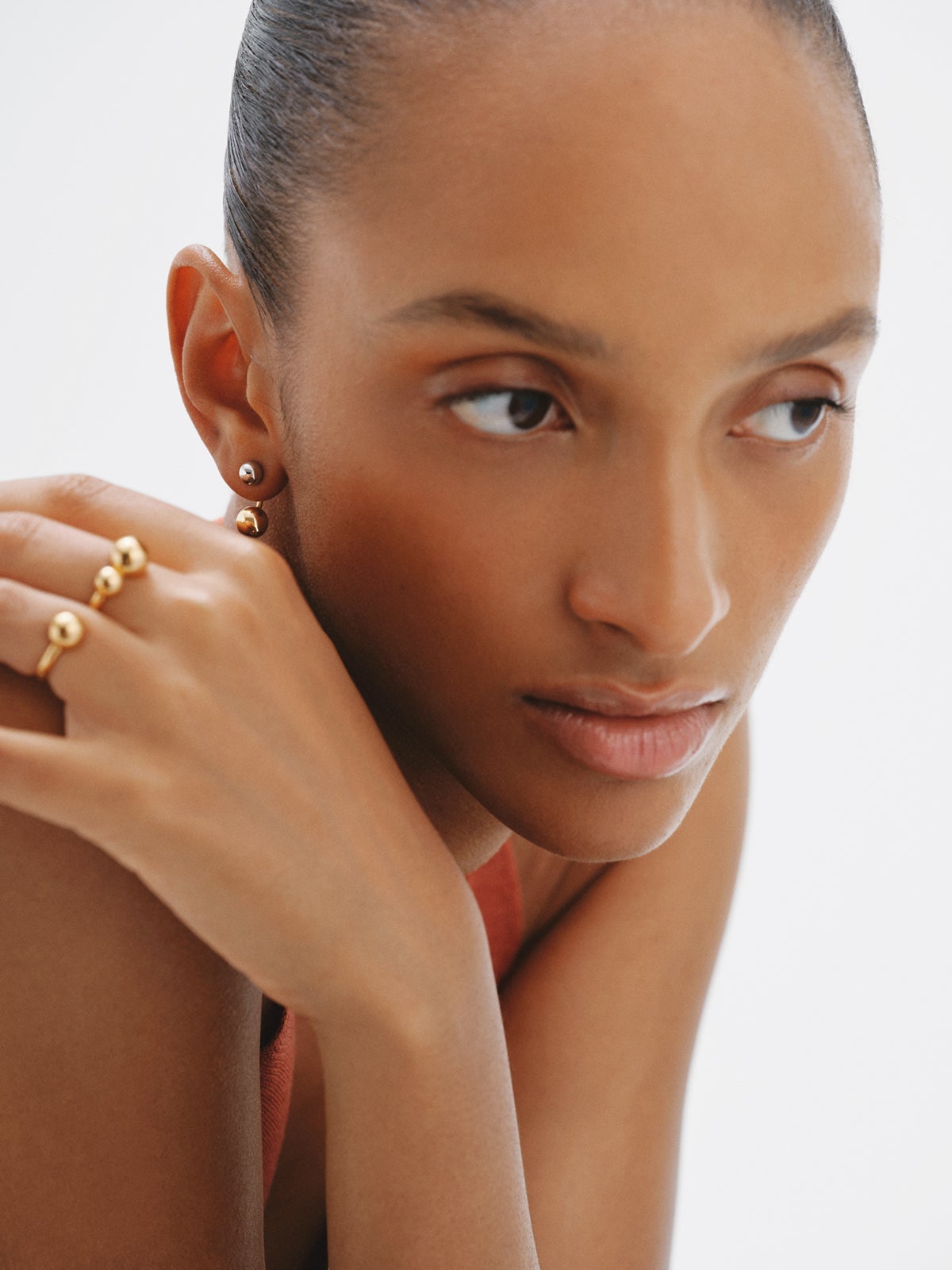 Double ring in 925 silver plated with 18K yellow gold with sphere motif
