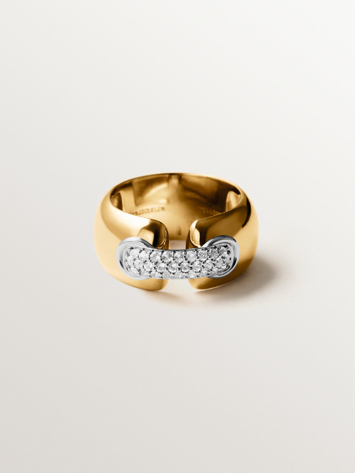 924 silver ring plated with rhodium and 18K yellow gold with white topaz pavé