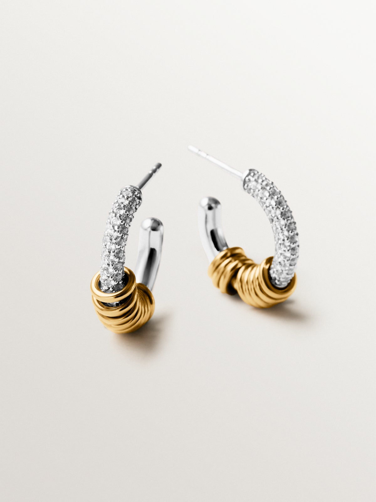 925 sterling silver hoop earrings plated with rhodium and 18K yellow gold with white topaz pavé
