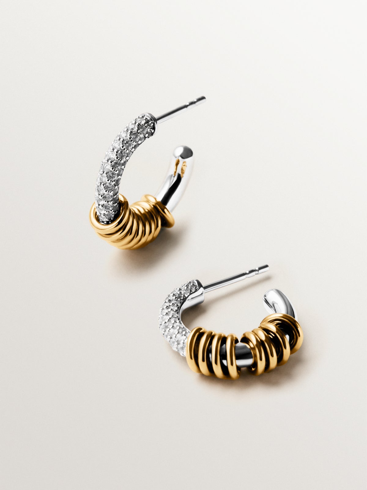 925 sterling silver hoop earrings plated with rhodium and 18K yellow gold with white topaz pavé