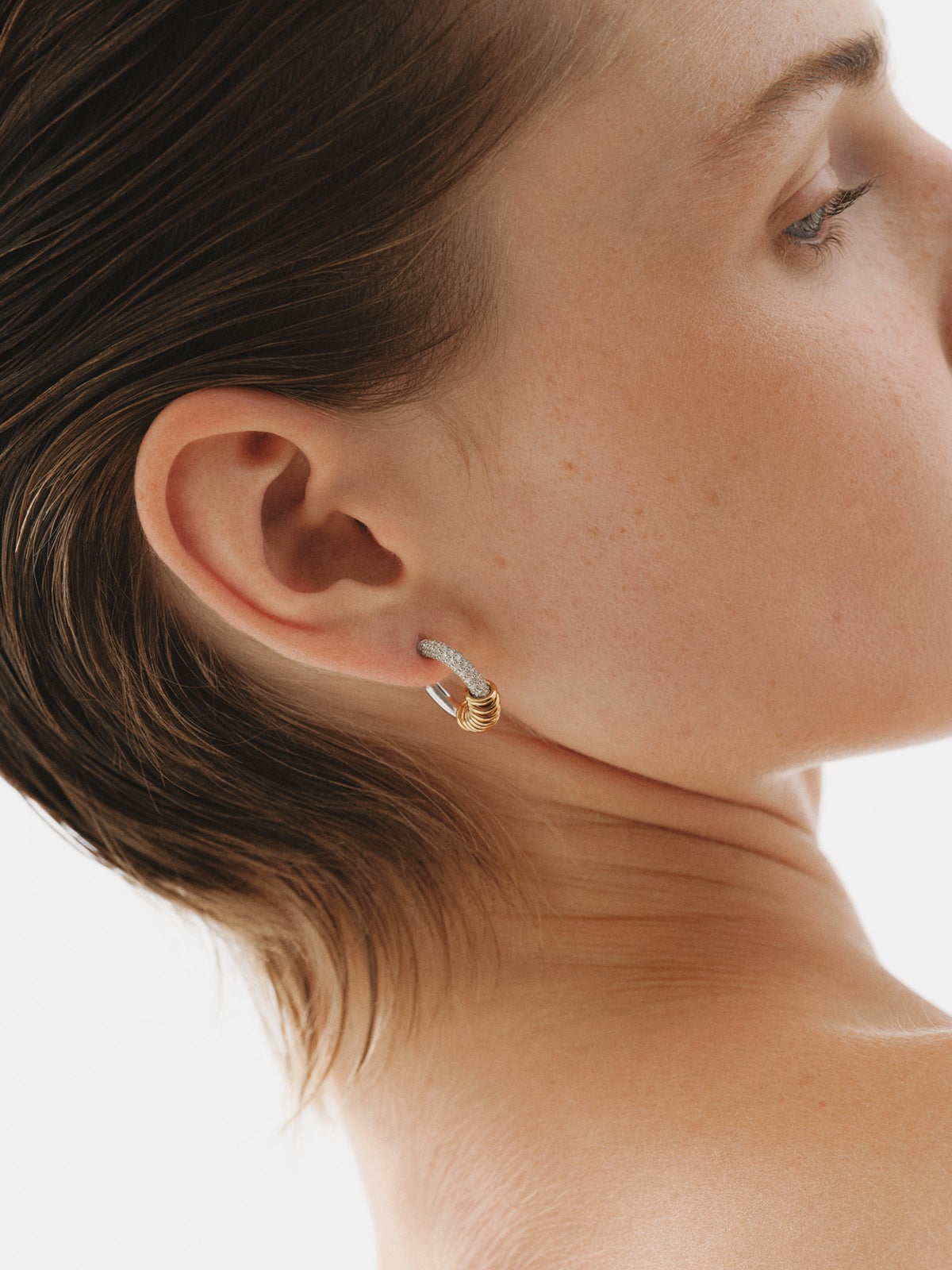925 sterling silver hoop earrings plated with rhodium and 18K yellow gold with white topaz pavé