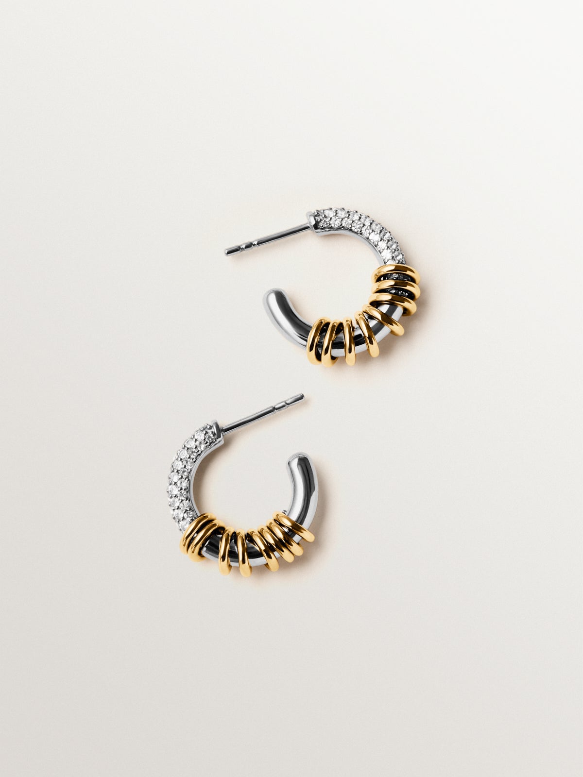 925 sterling silver hoop earrings plated with rhodium and 18K yellow gold with white topaz pavé