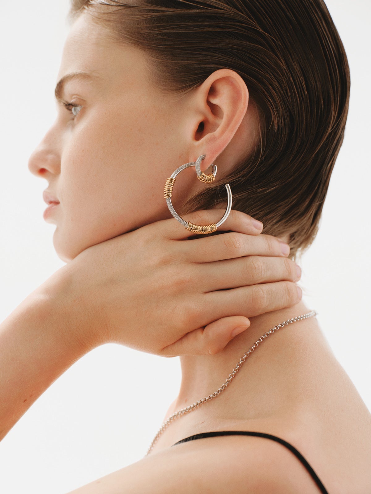 925 sterling silver hoop earrings plated with rhodium and 18K yellow gold with white topaz pavé