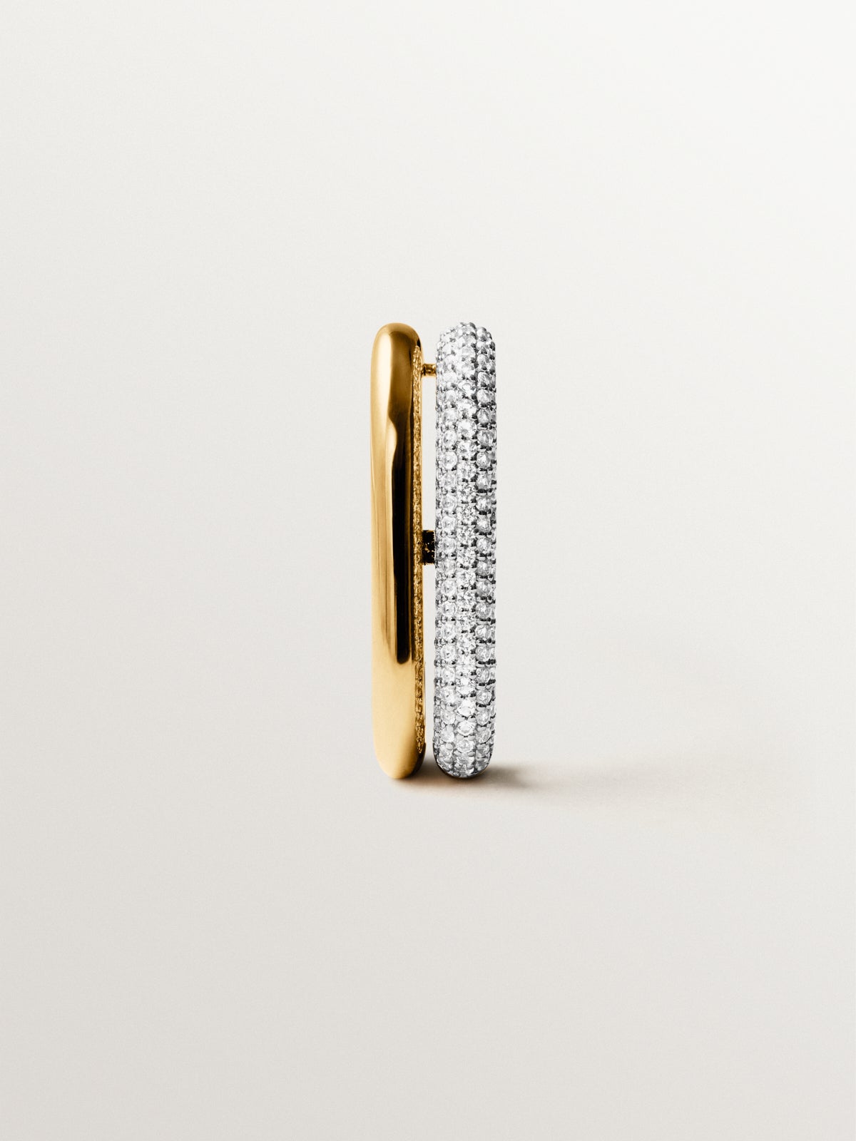 Single earring in 925 silver plated in 18K yellow gold with white topaz pavé