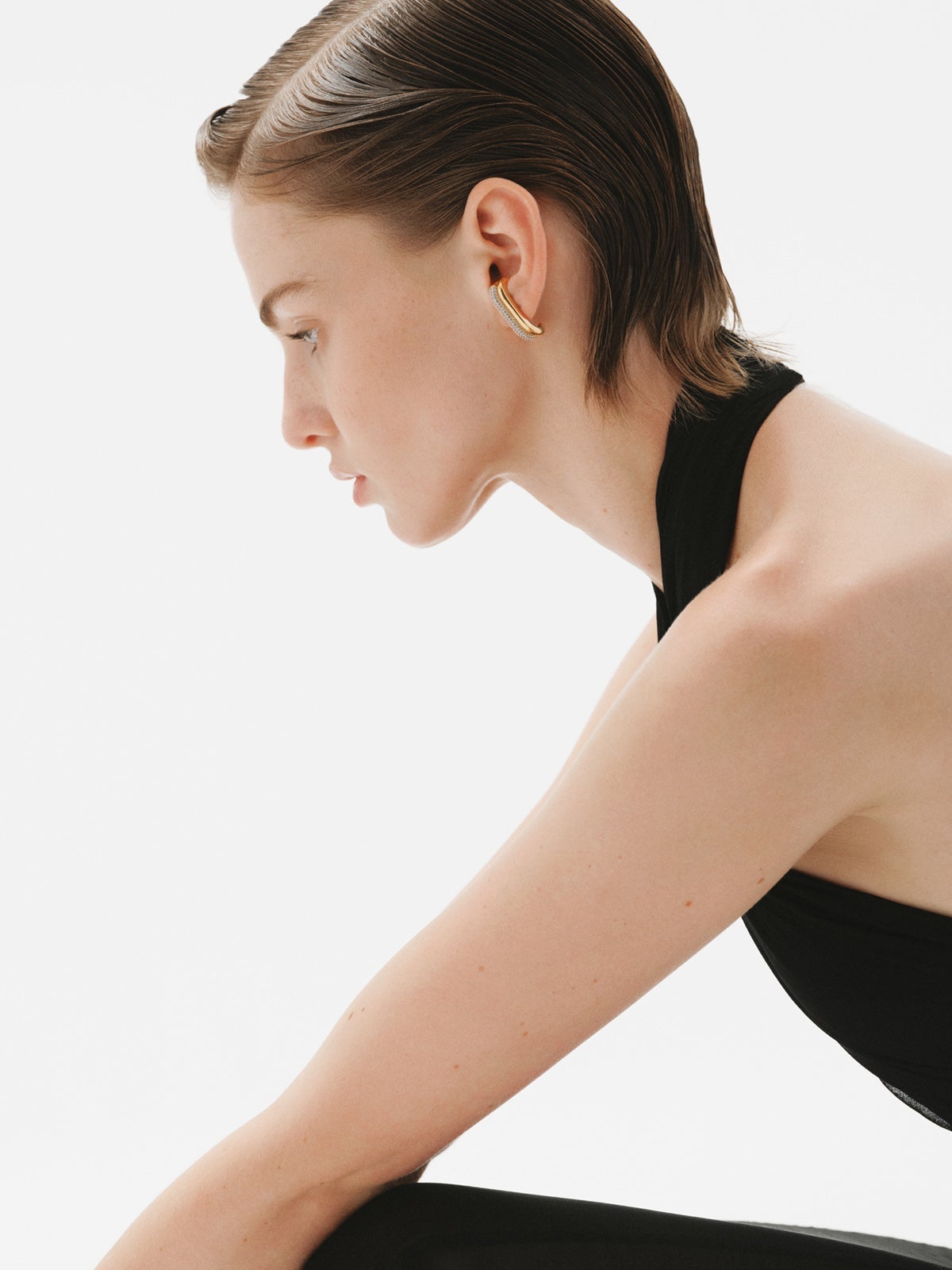 Single earring in 925 silver plated in 18K yellow gold with white topaz pavé