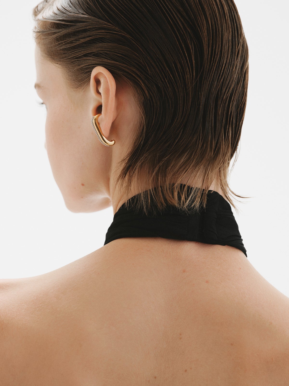 Single earring in 925 silver plated in 18K yellow gold with white topaz pavé