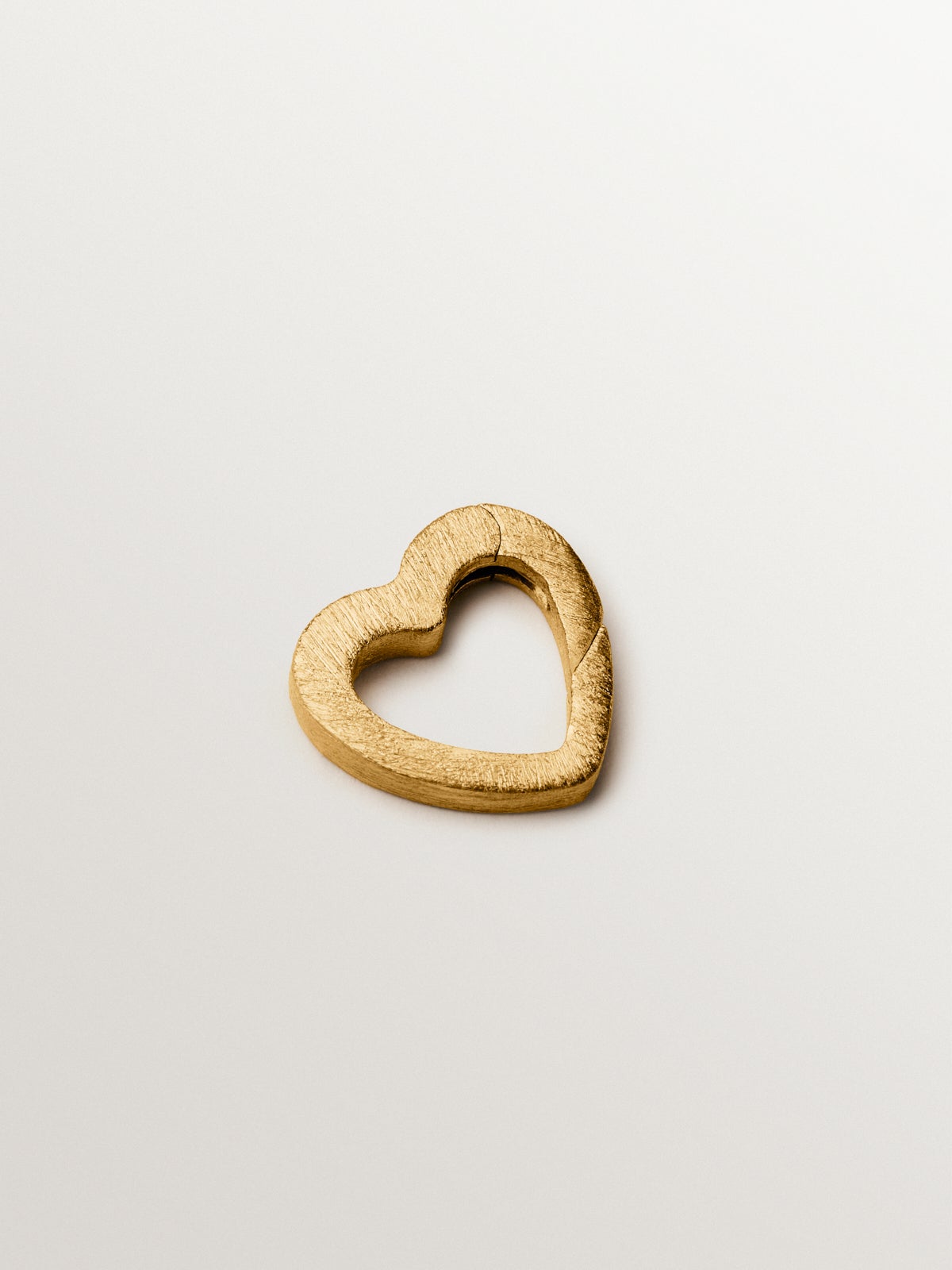 Heart charm in silver plated in 18K yellow gold
