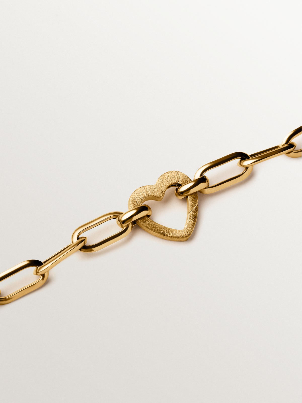 Heart charm in silver plated in 18K yellow gold