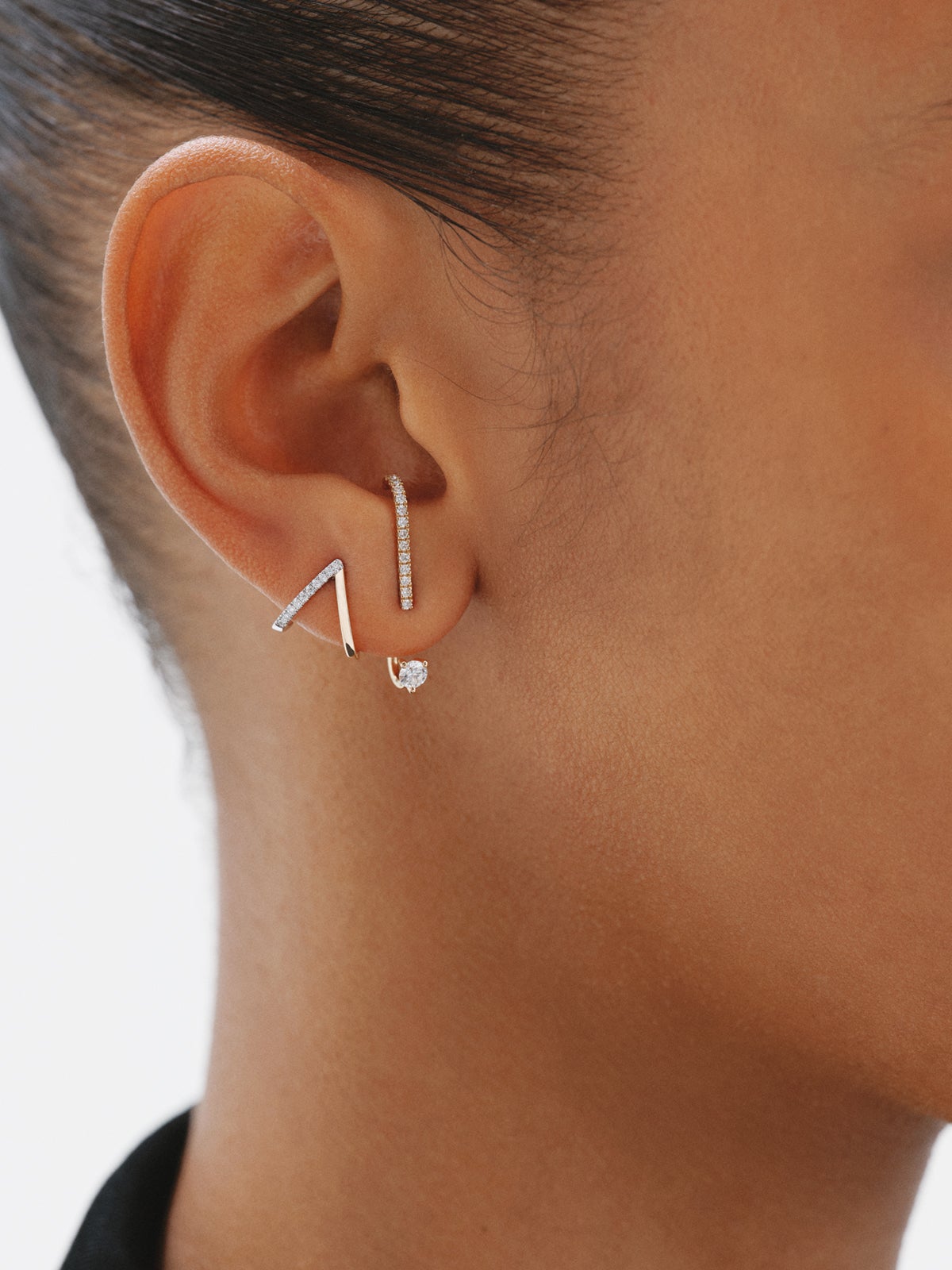 Single earring in 18K white and yellow gold with diamonds