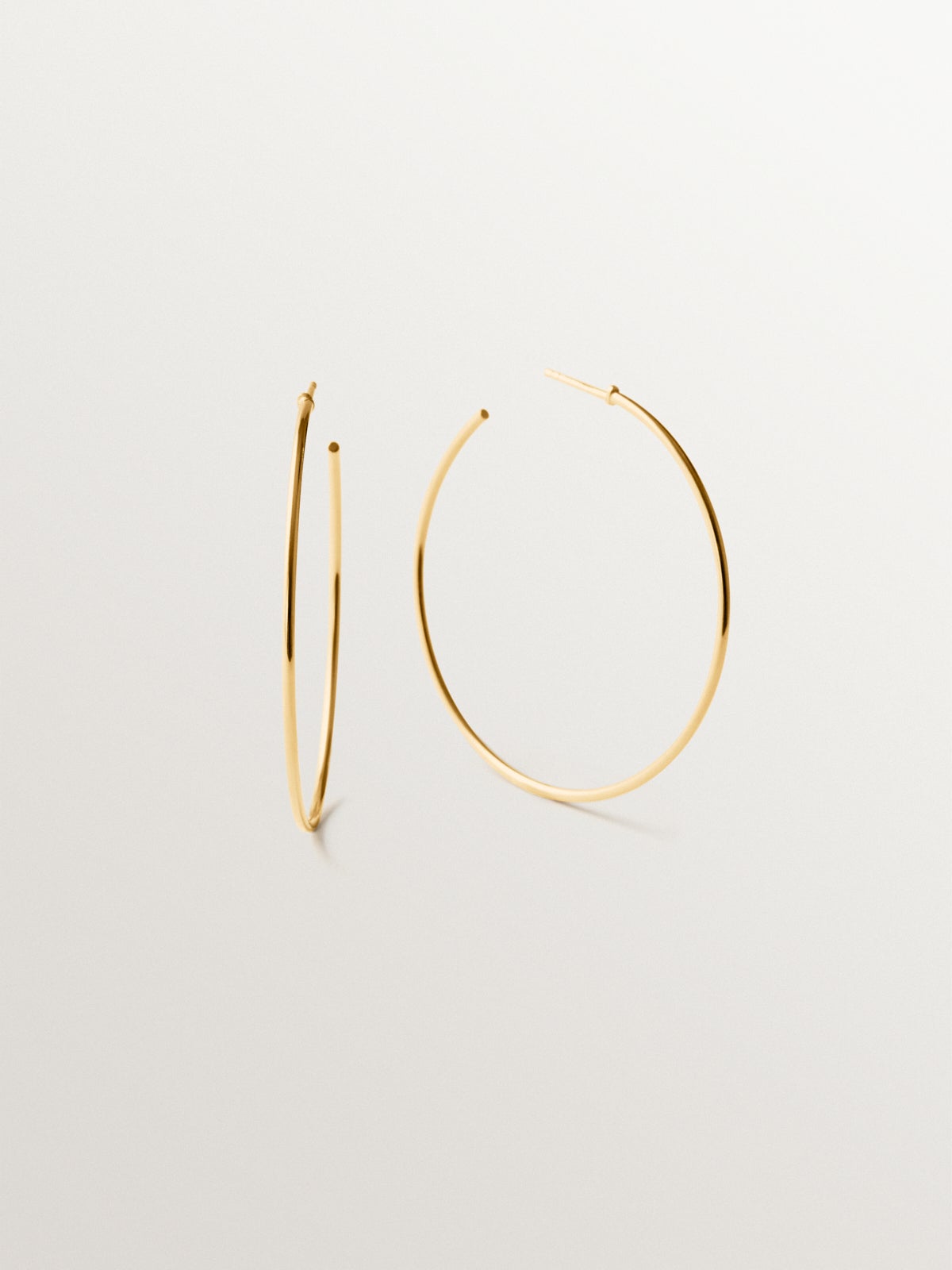 Medium hoop earrings made of 925 silver plated with 18K gold
