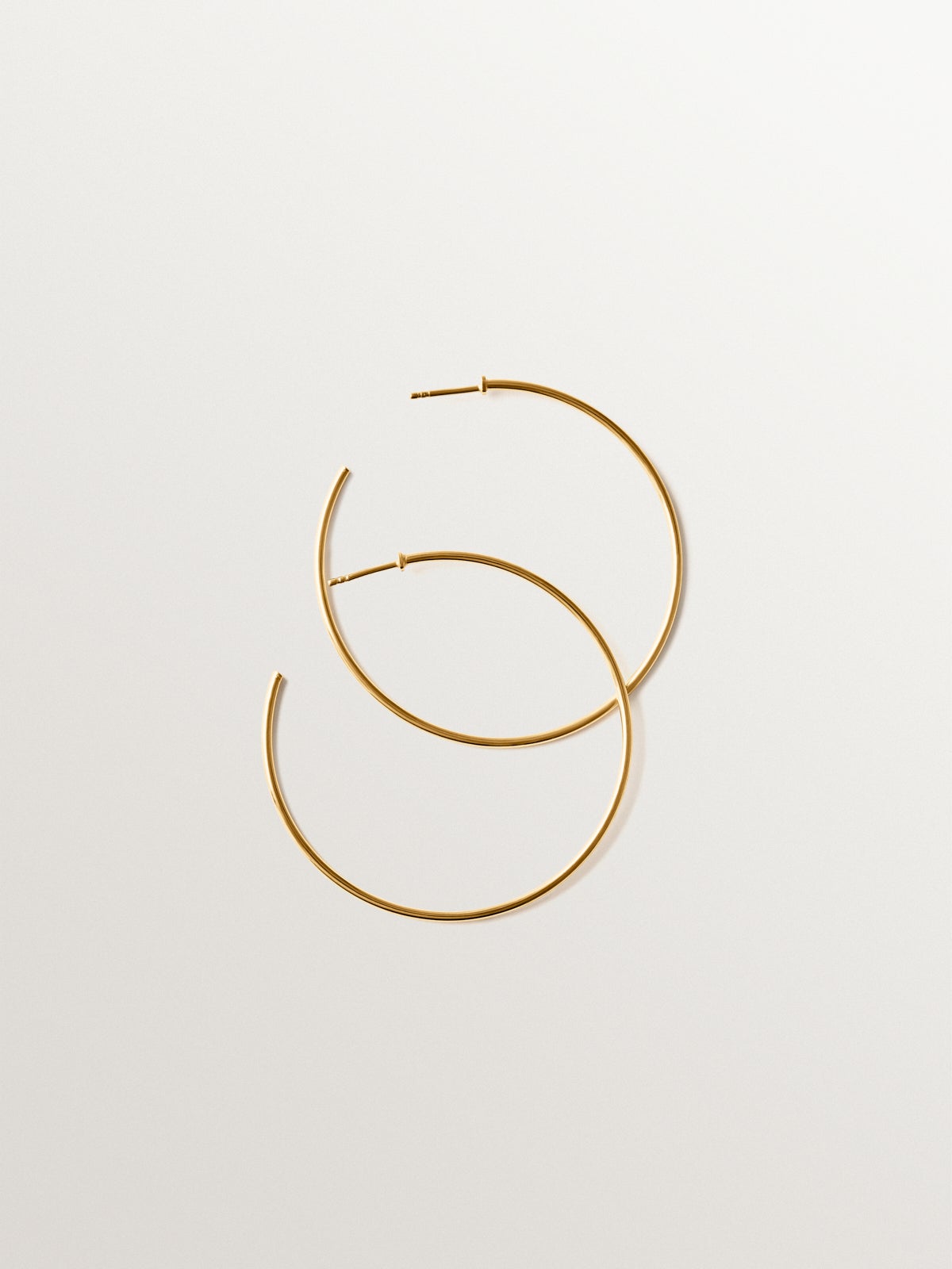 Medium hoop earrings made of 925 silver plated with 18K gold