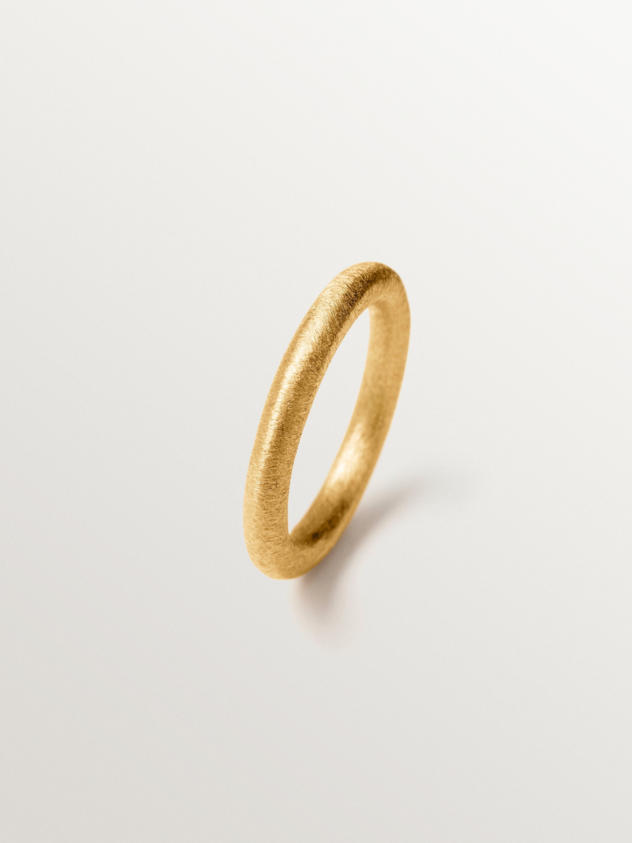 Small textured ring made of 925 silver plated with 18K gold