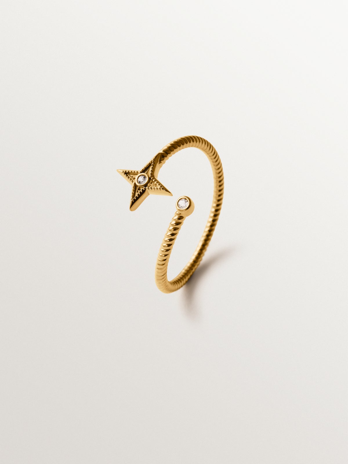 925 silver rigid bracelet plated in 18K yellow gold with white topaz