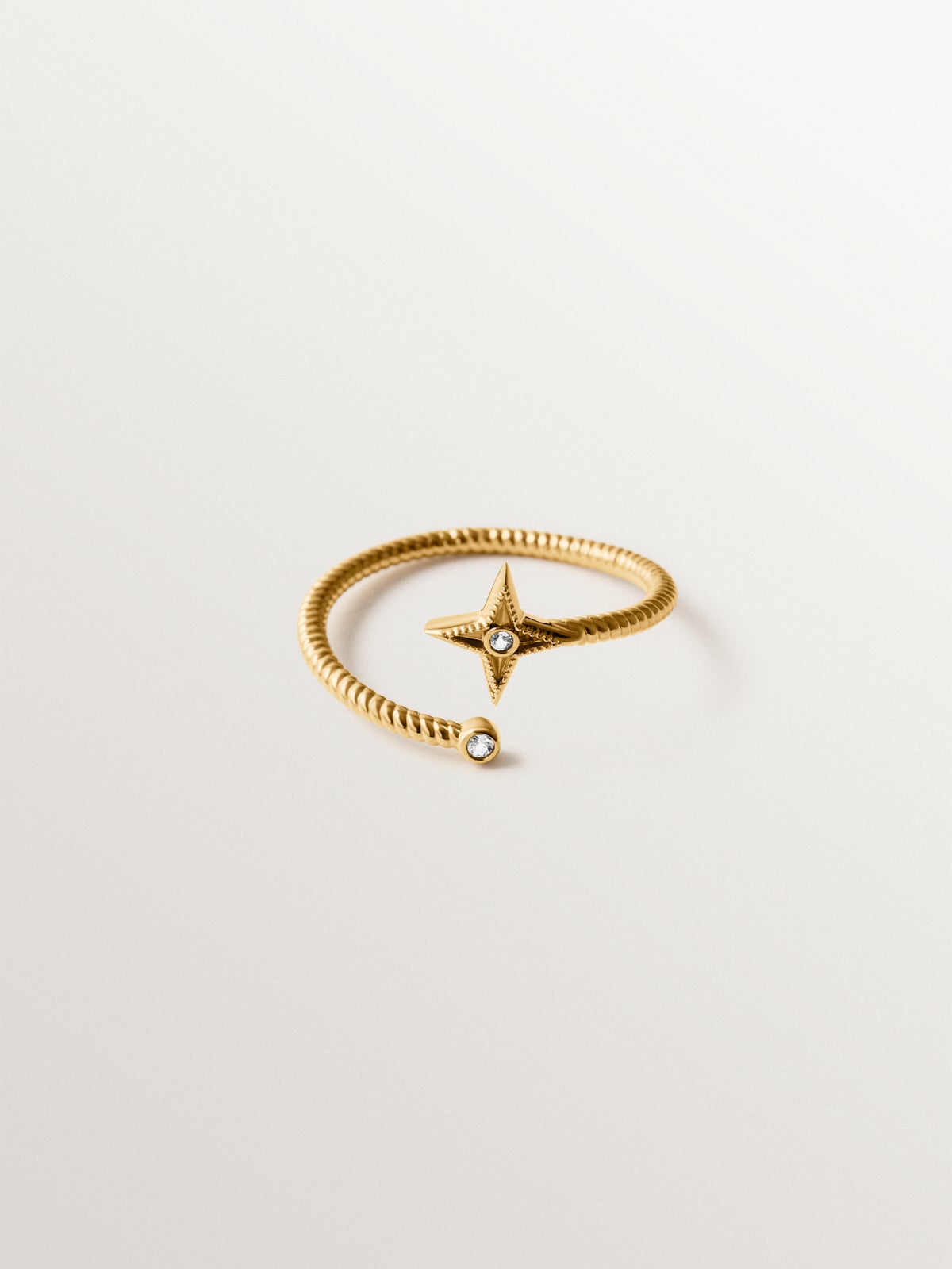 925 silver rigid bracelet plated in 18K yellow gold with white topaz