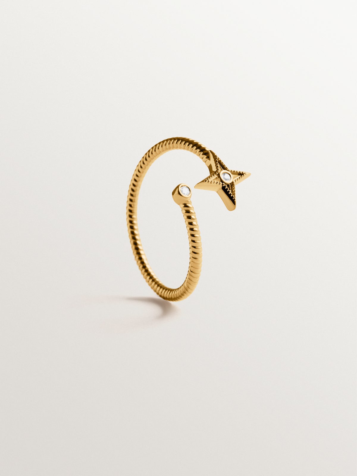 925 silver rigid bracelet plated in 18K yellow gold with white topaz