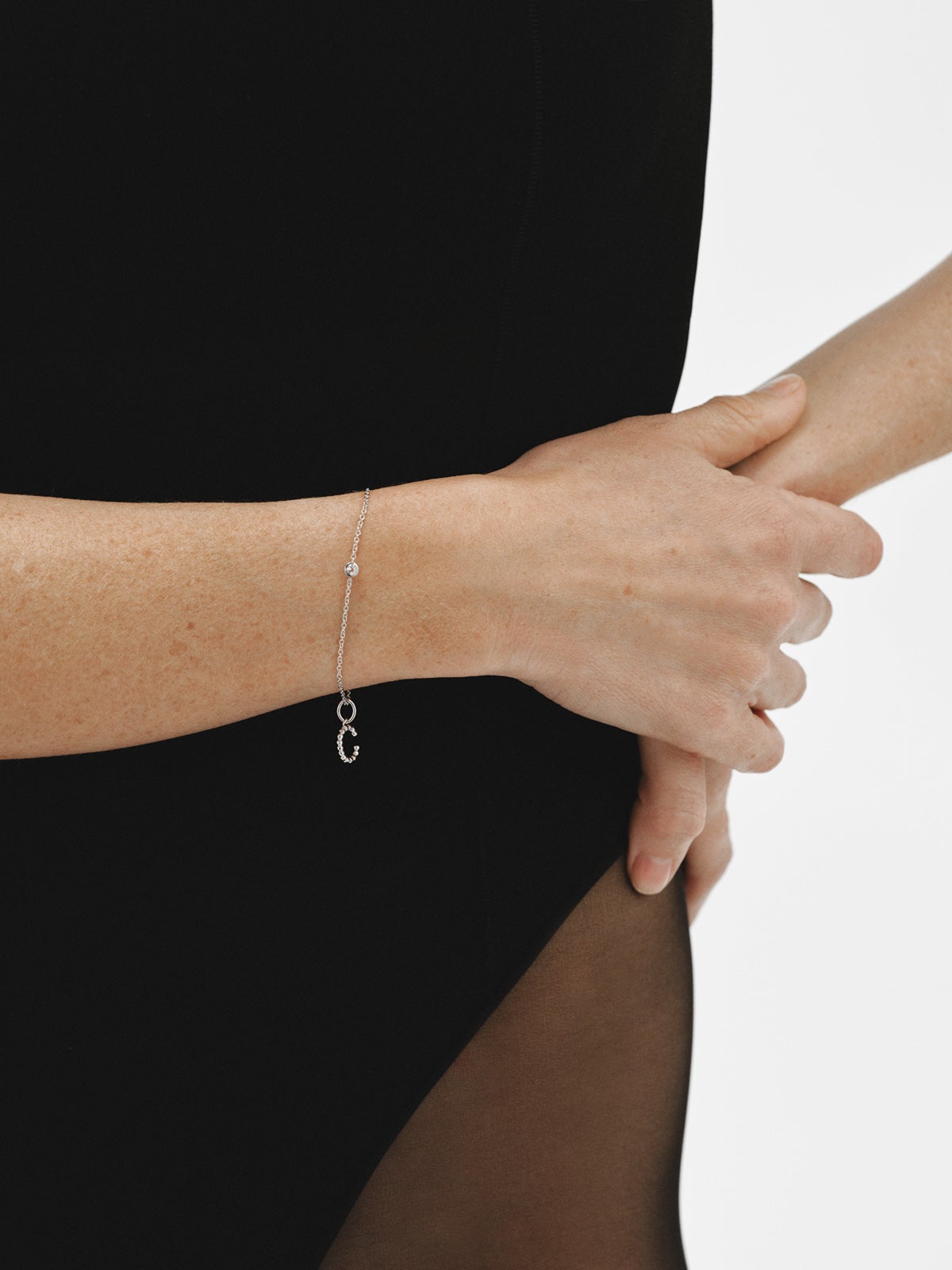 925 silver charm with letter C and sphere motifs