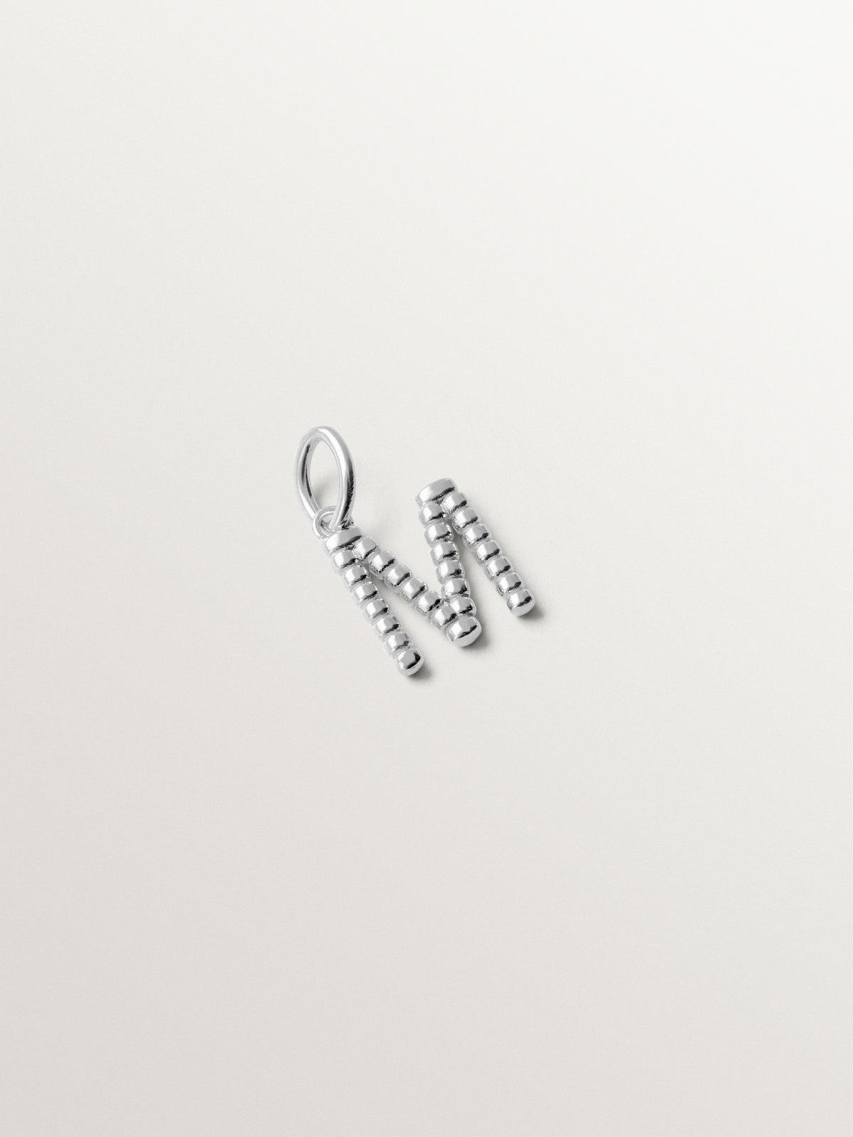 925 silver charm with letter M and sphere motifs