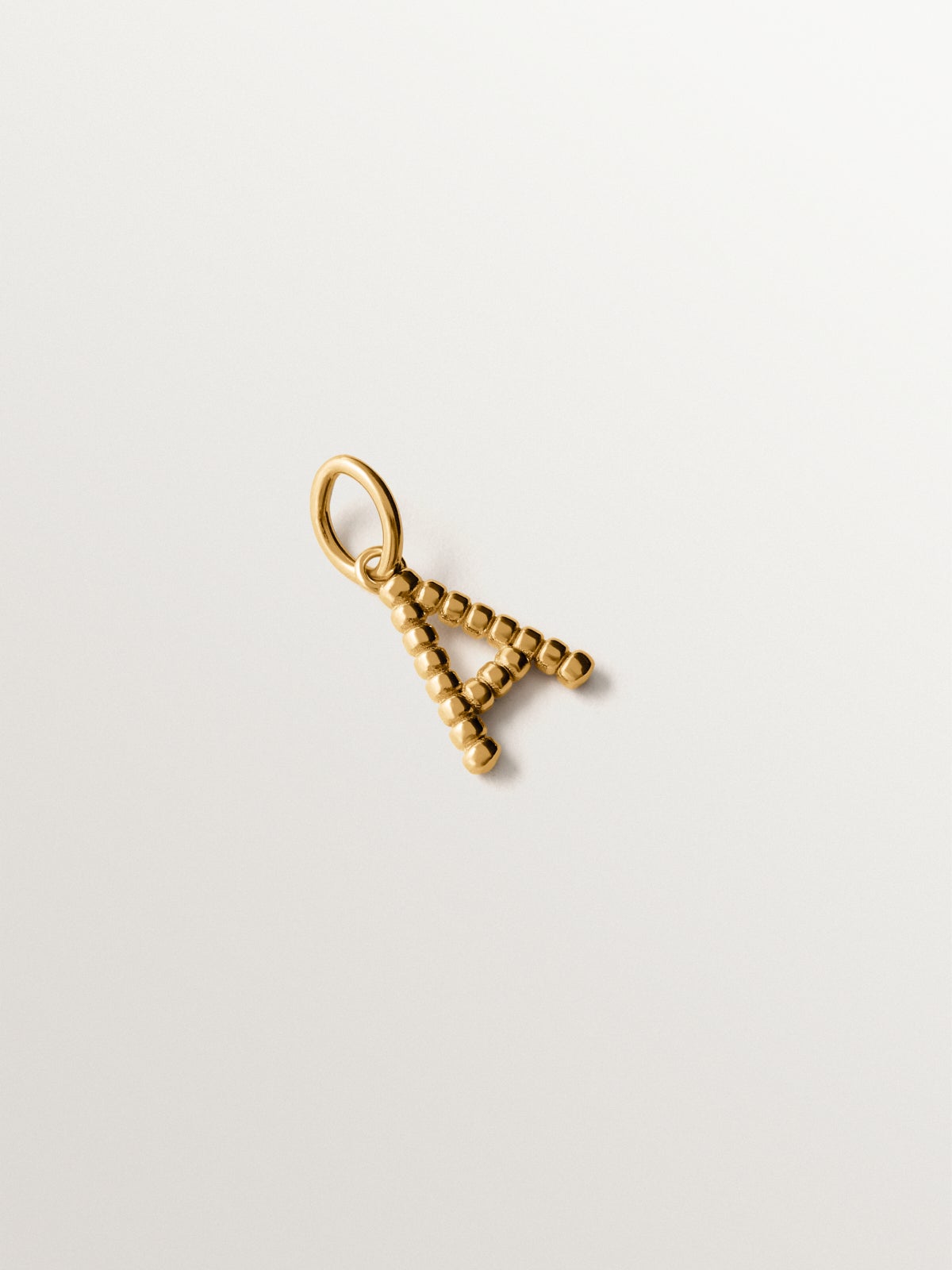 925 silver charm plated in 18K yellow gold with letter A and dial motifs
