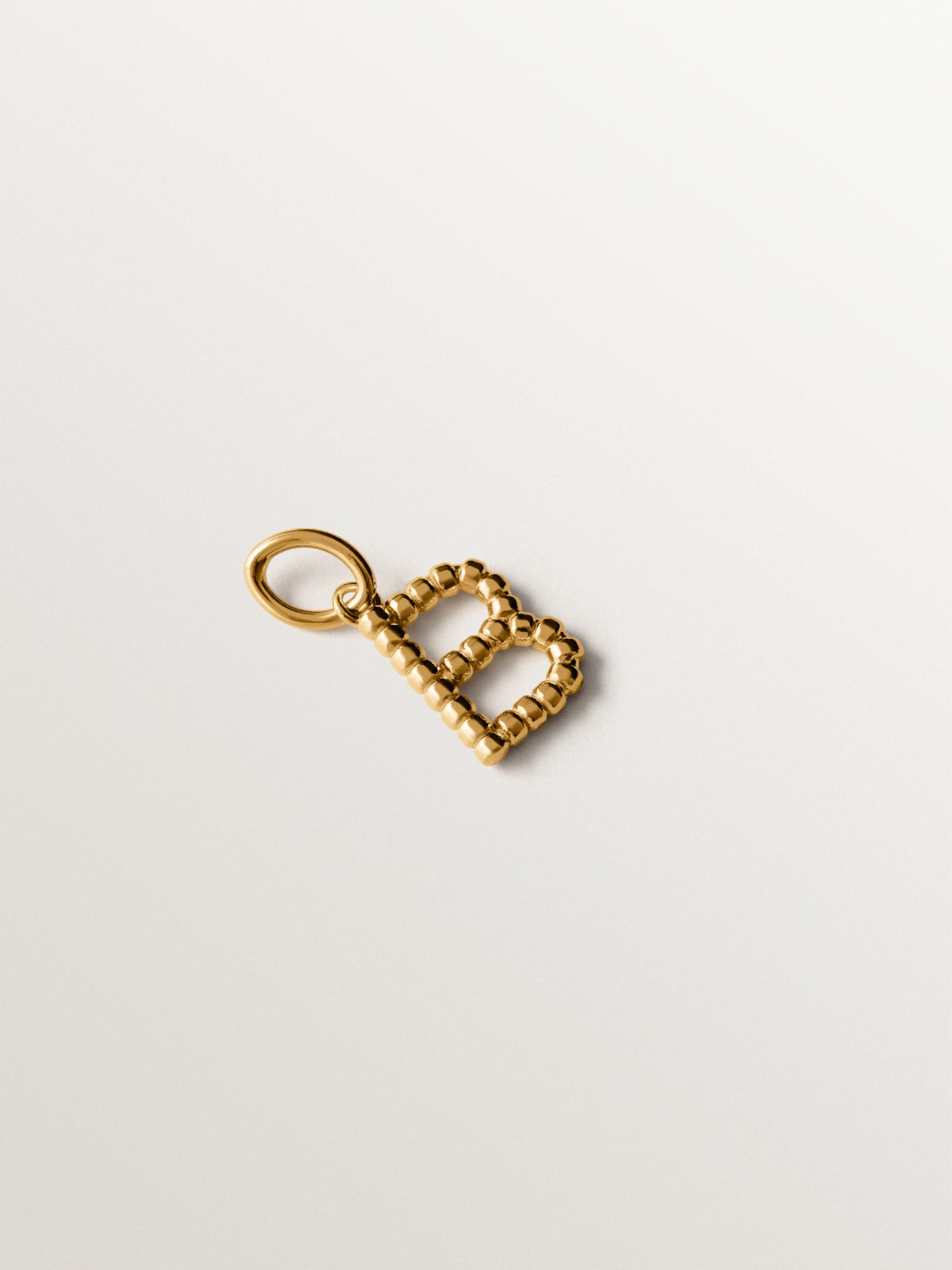925 silver charm plated in 18K yellow gold with letter B and dial motifs
