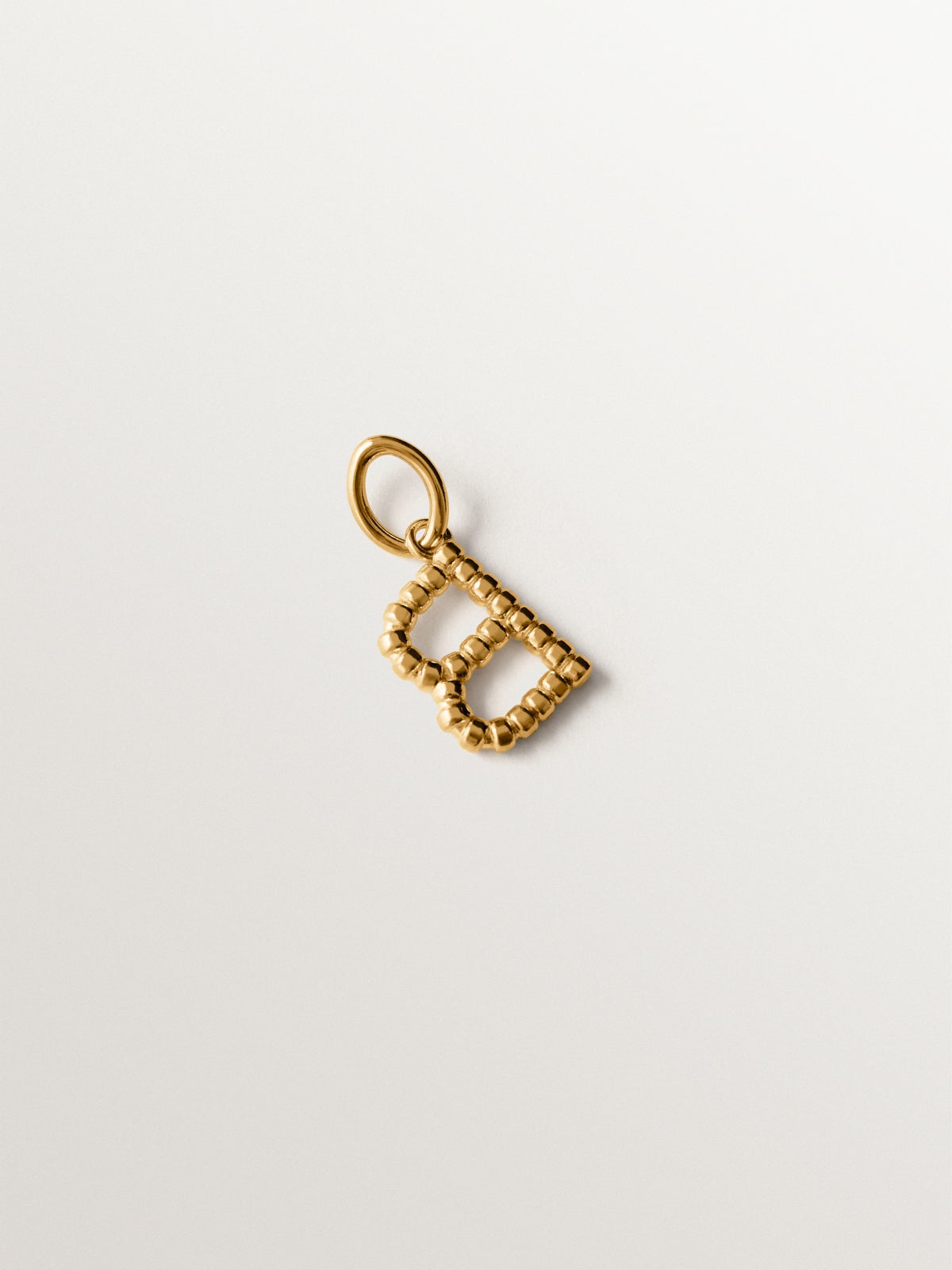 925 silver charm plated in 18K yellow gold with letter B and dial motifs