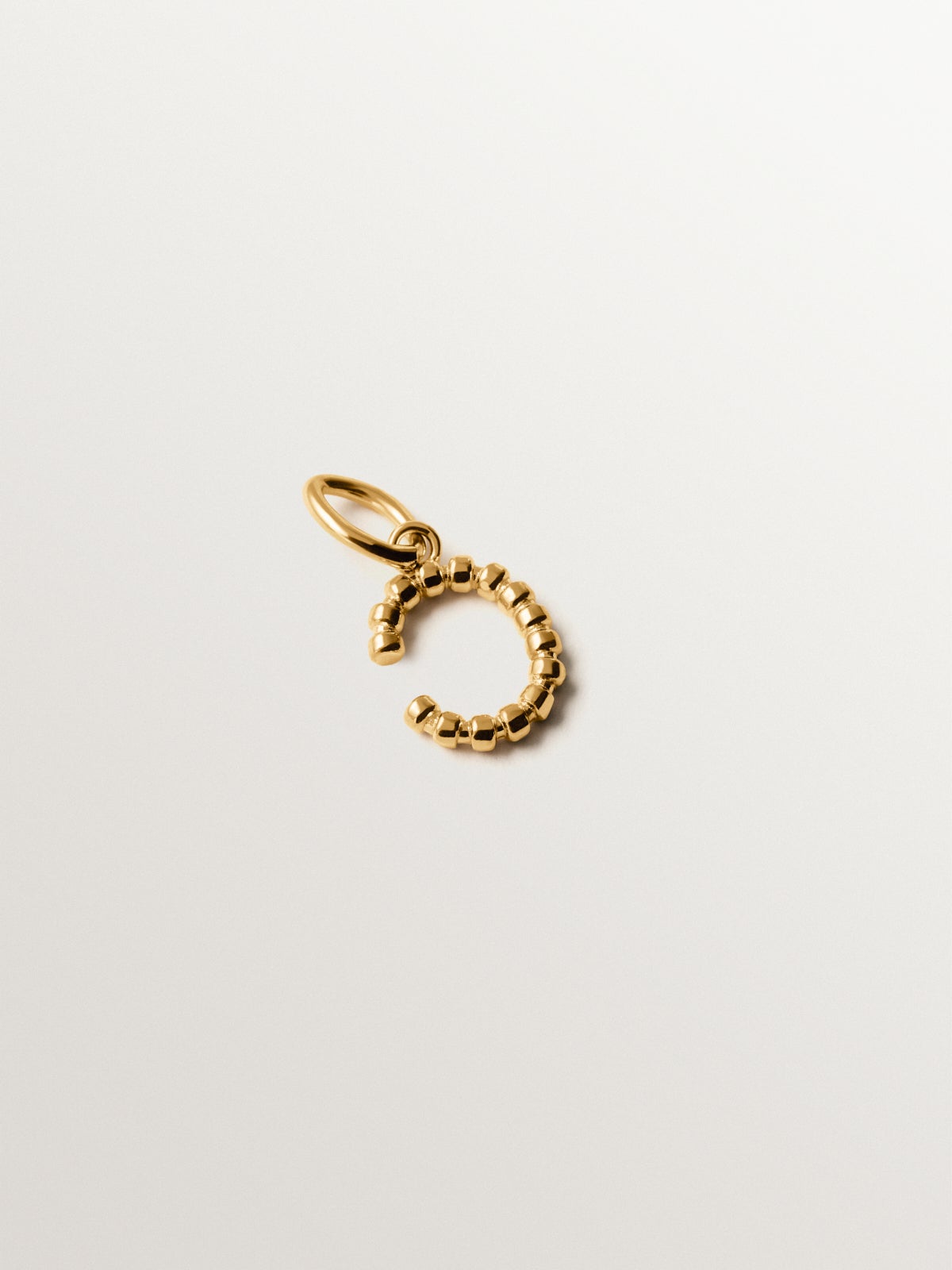 925 silver charm plated in 18K yellow gold with letter C and dial motifs