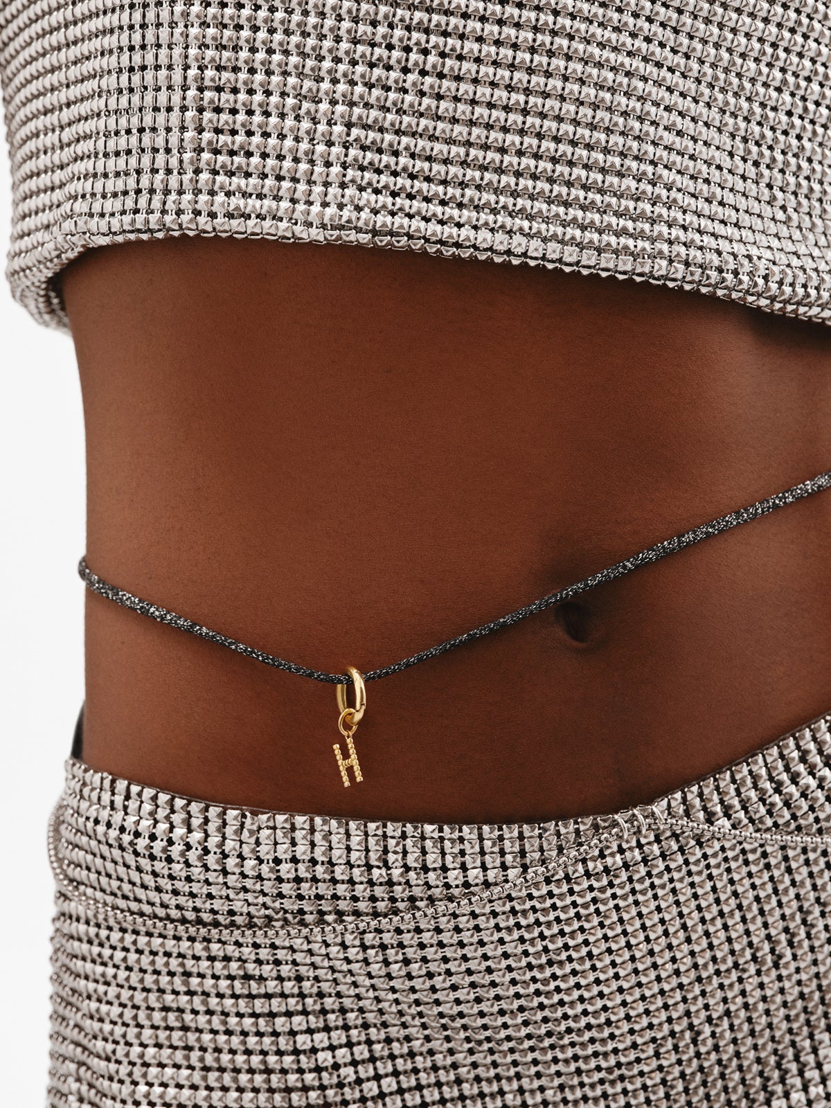 925 silver charm plated in 18K yellow gold with letter H and dial motifs