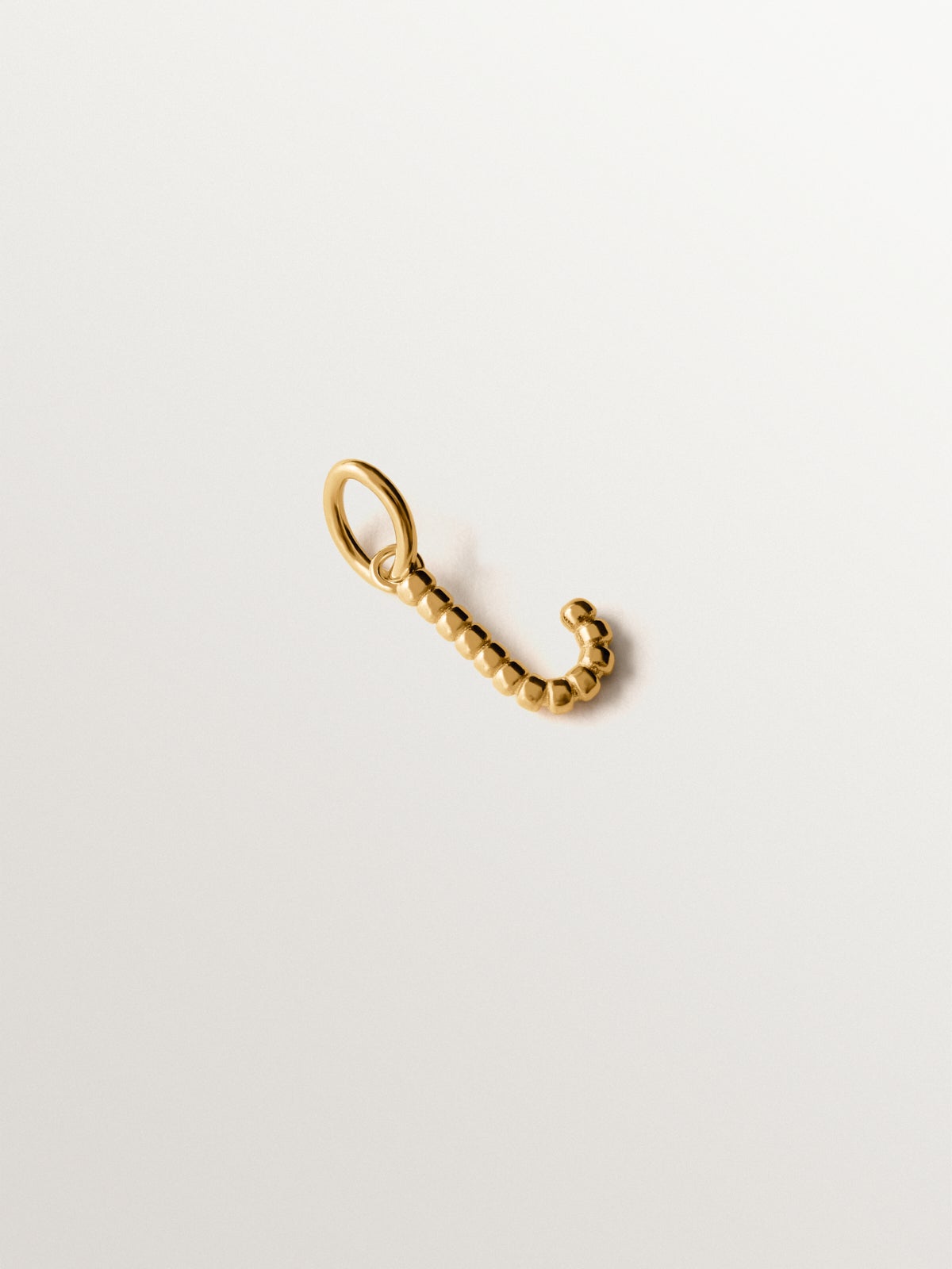 925 silver charm plated in 18K yellow gold with letter J and dial motifs
