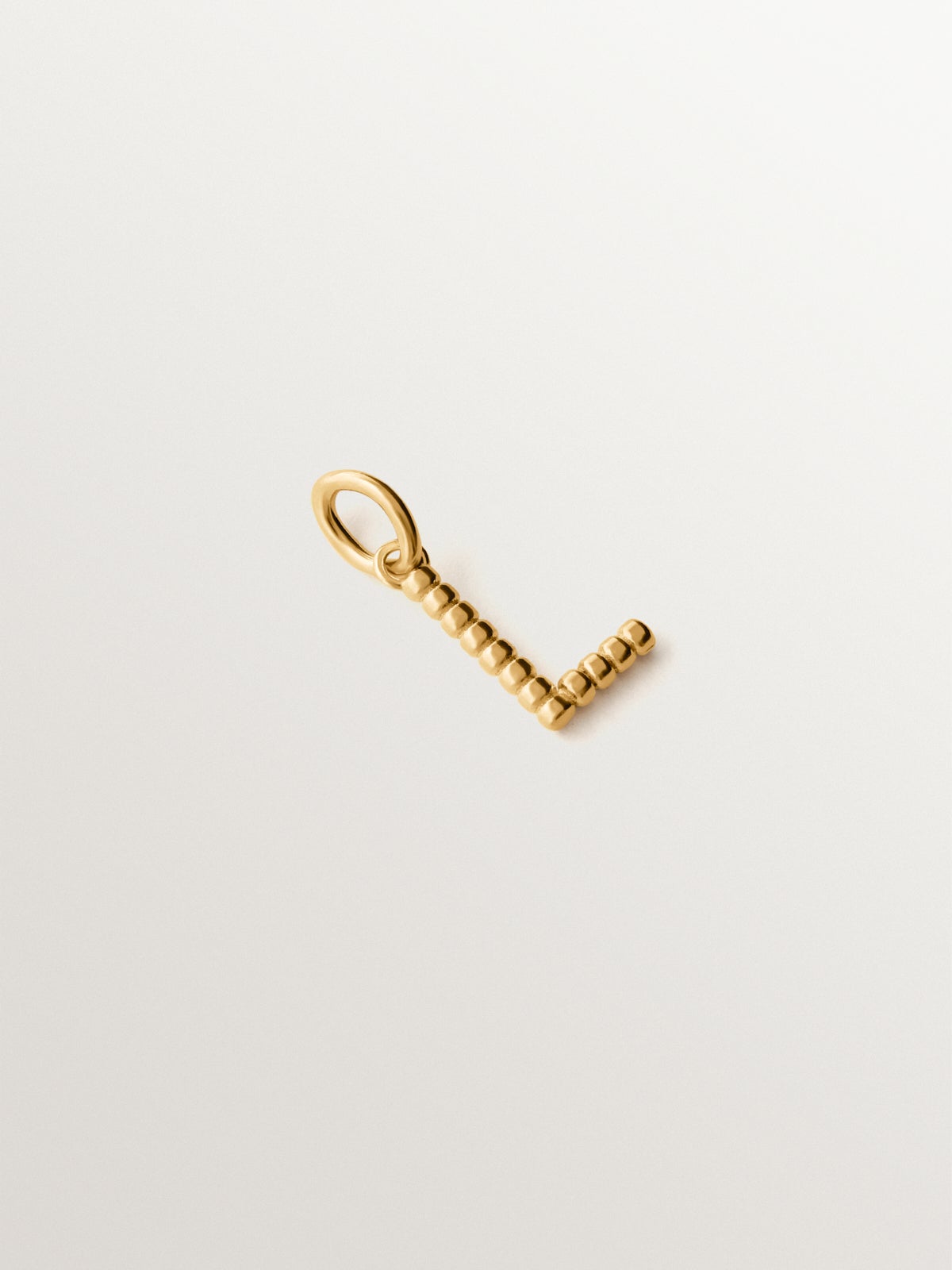 925 silver charm plated in 18K yellow gold with letter L and dial motifs