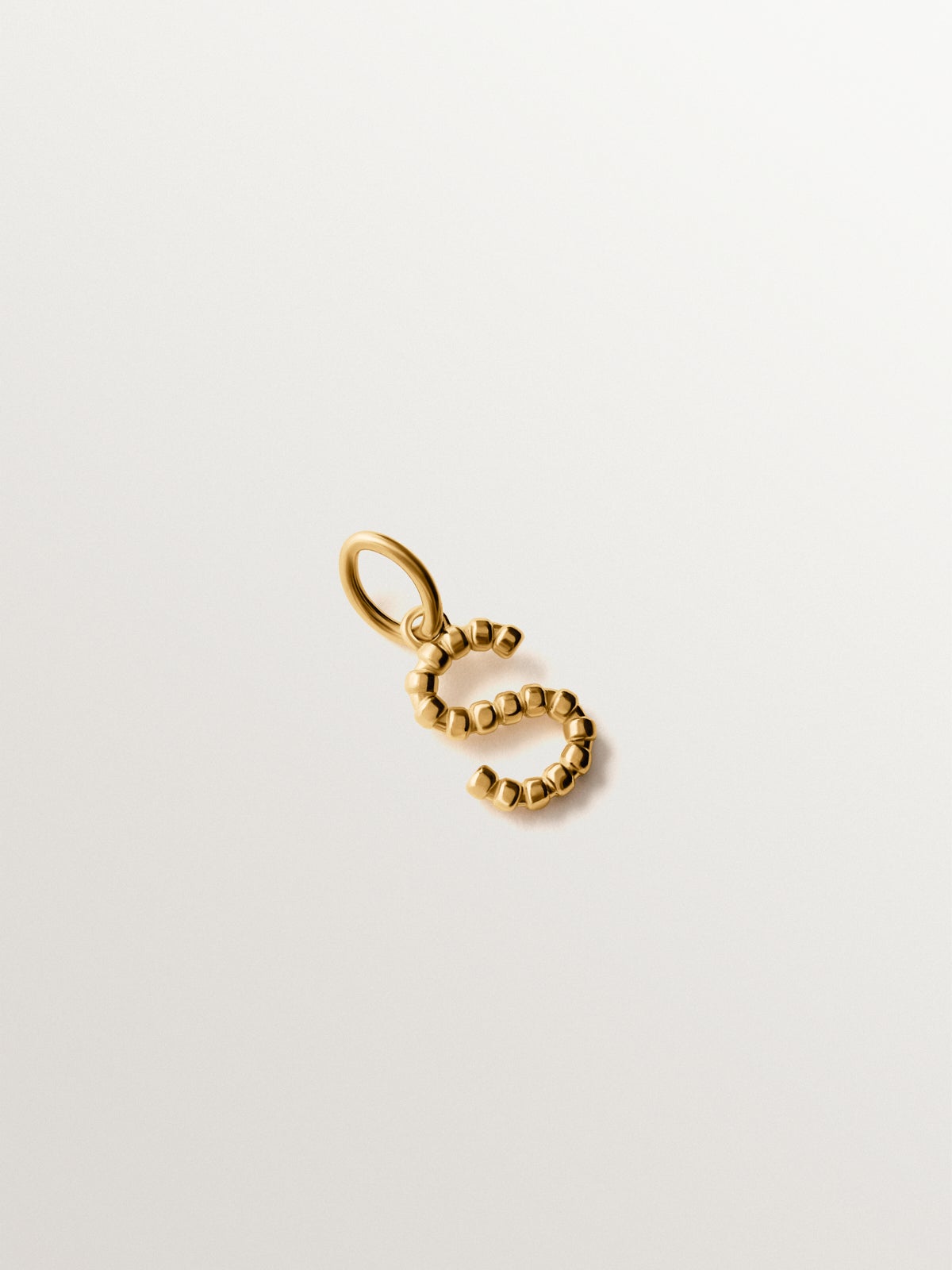925 silver charm plated in 18K yellow gold with letter S and dial motifs